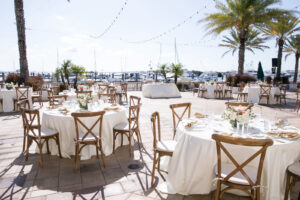 Round Table with White Linen and Rustic Cross back Wooden Chairs | Westshore Yacht Club