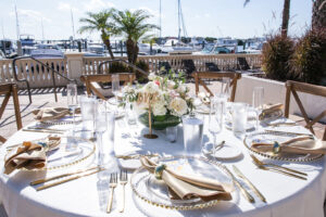 White Linen on Round Wedding Tablescape Overlooking the Water | Westshore Yacht Club