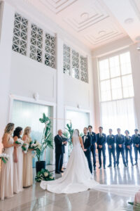 White and Green Modern Minimalist Tropical Wedding Ceremony, Bride and Groom Exchanging Wedding Vows | Tampa Bay Wedding Planner Taylored Affairs | Downtown Tampa Historic Wedding Venue The Vault