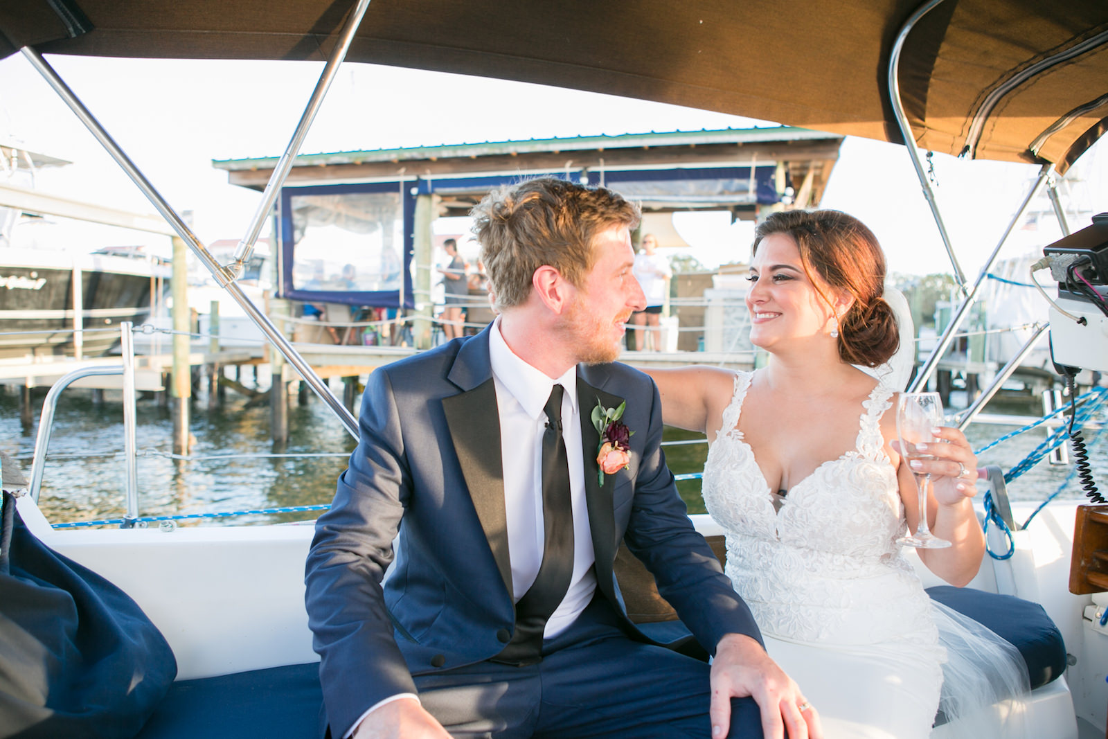 Florida Bride and Groom Sitting on Boat Wedding Portrait | Tampa Bay Wedding Photographer Carrie Wildes Photography
