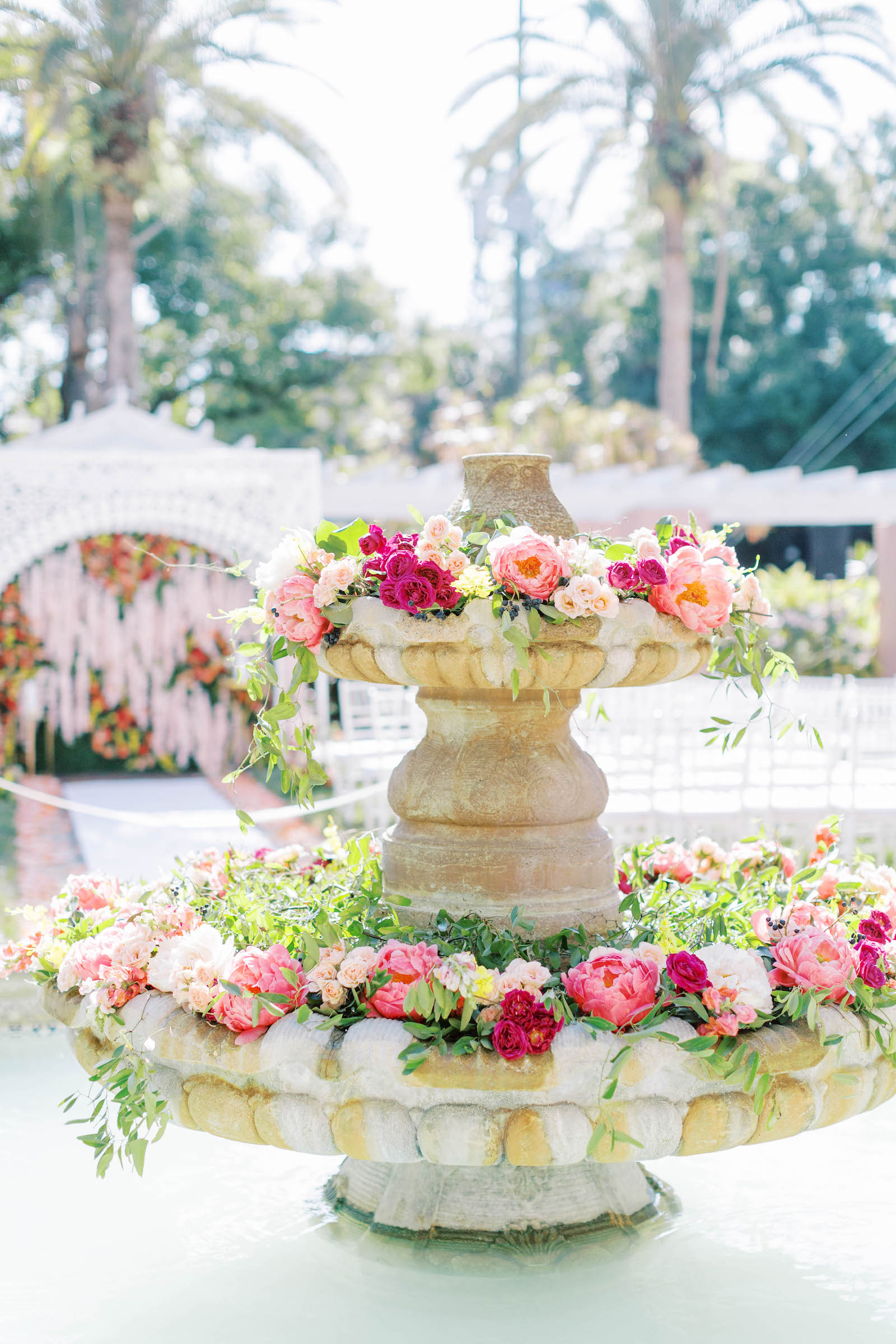 Fountain with Floral Décor in Pink and Orange with Greenery at the Vinoy Renaissance St. Petersburg | St. Petersburg Wedding Planner Parties a la CarteFountain with Floral Décor in Pink and Orange with Greenery at the Vinoy Renaissance St. Petersburg | St. Petersburg Wedding Planner Parties a la Carte