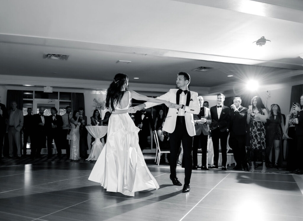 Classic Bride and Groom Dancing at Wedding Reception in Ballroom of Historic St. Pete Wedding Venue The Don CeSar Hotel | Tampa Bay Lighting Gabro Event Services