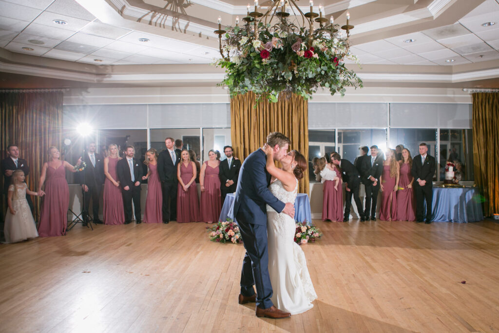 Three Tier Wedding Burgundy Red and White Wedding Cake, Real Mauve, Blush Pink and Red Roses Cake Topper on Gold Geometric Stand | Tampa Bay Wedding Photographer Carrie Wildes Photography | Wedding Florist Iza’s Flowers