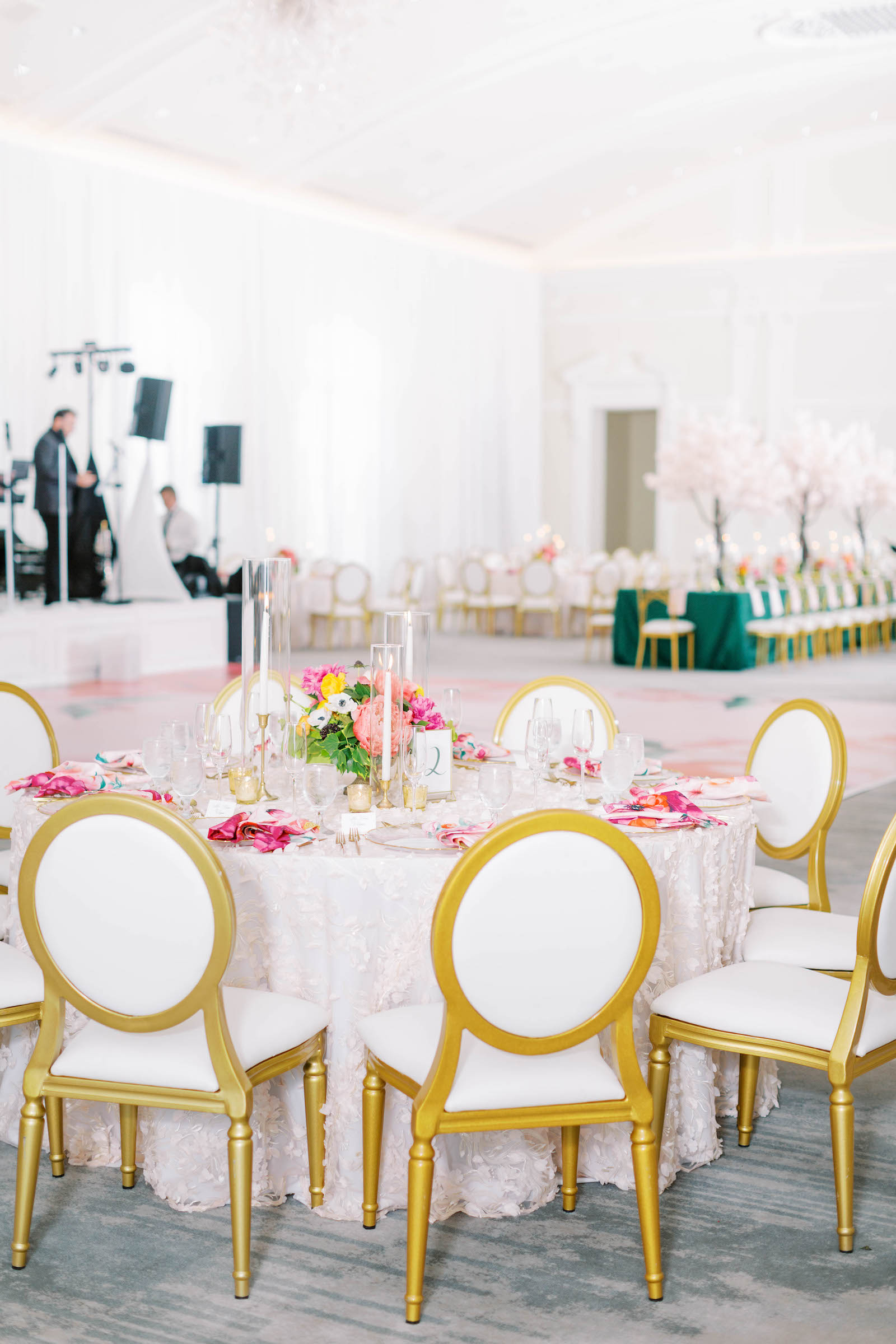 White and Gold Chairs at Wedding Reception with Hot Pink Accents