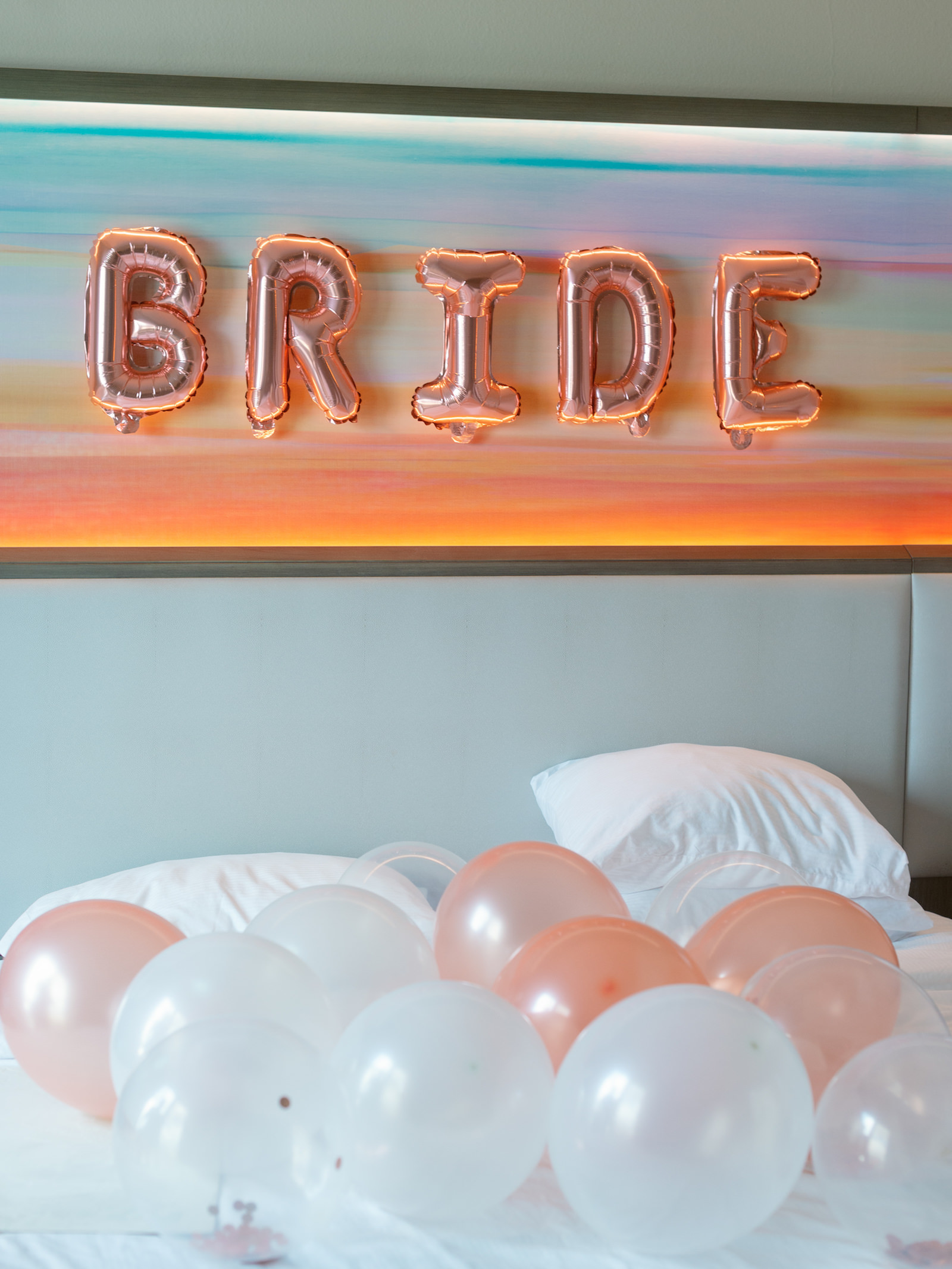 White and Green Modern Tropical Minimalist, Rose Gold Bride Letter Balloons Above Bed