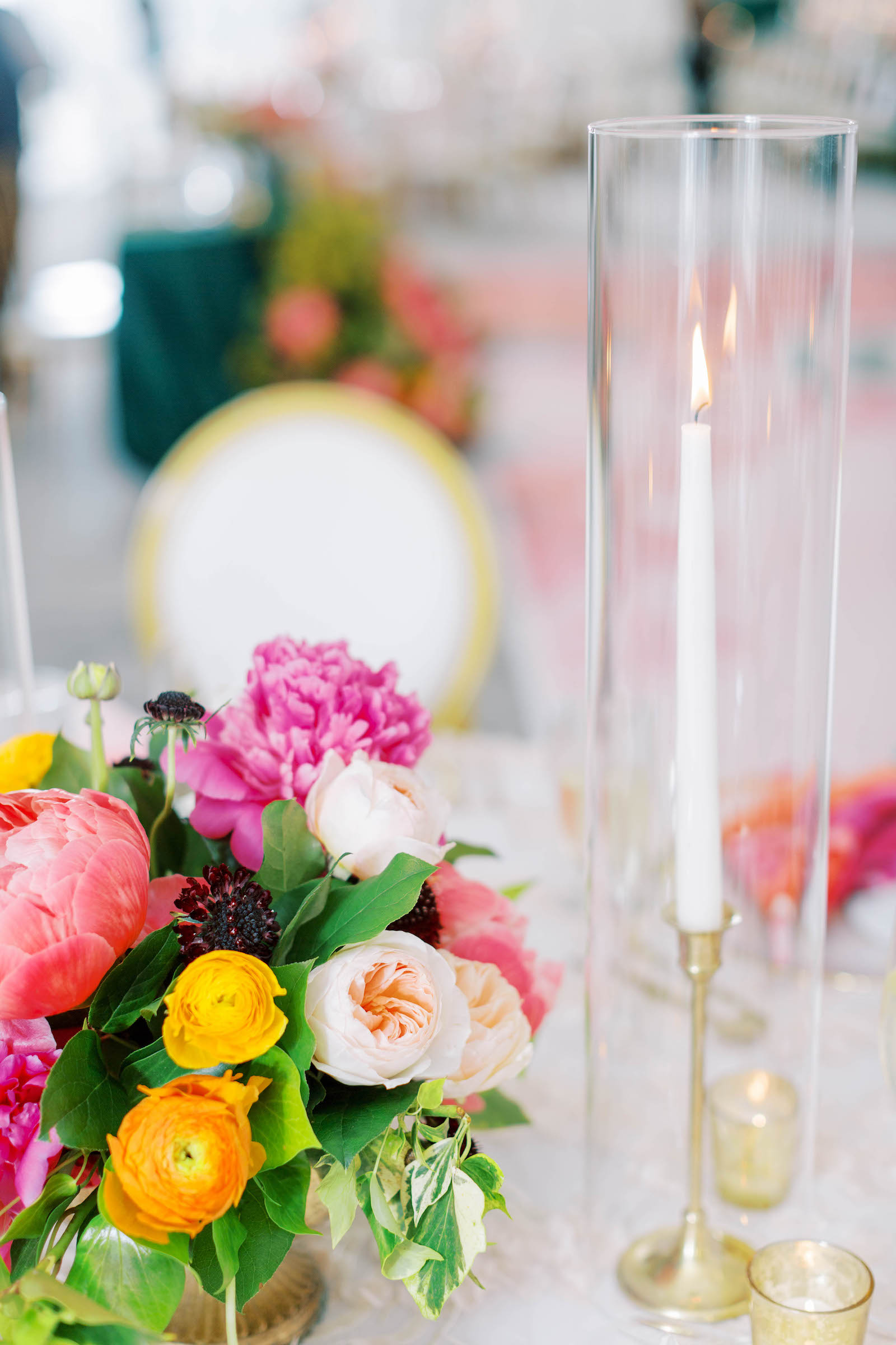 White and Gold Chairs at Wedding Reception with Hot Pink Accents | Tropical Details and Long White Candlesticks with Gold Candle Holders