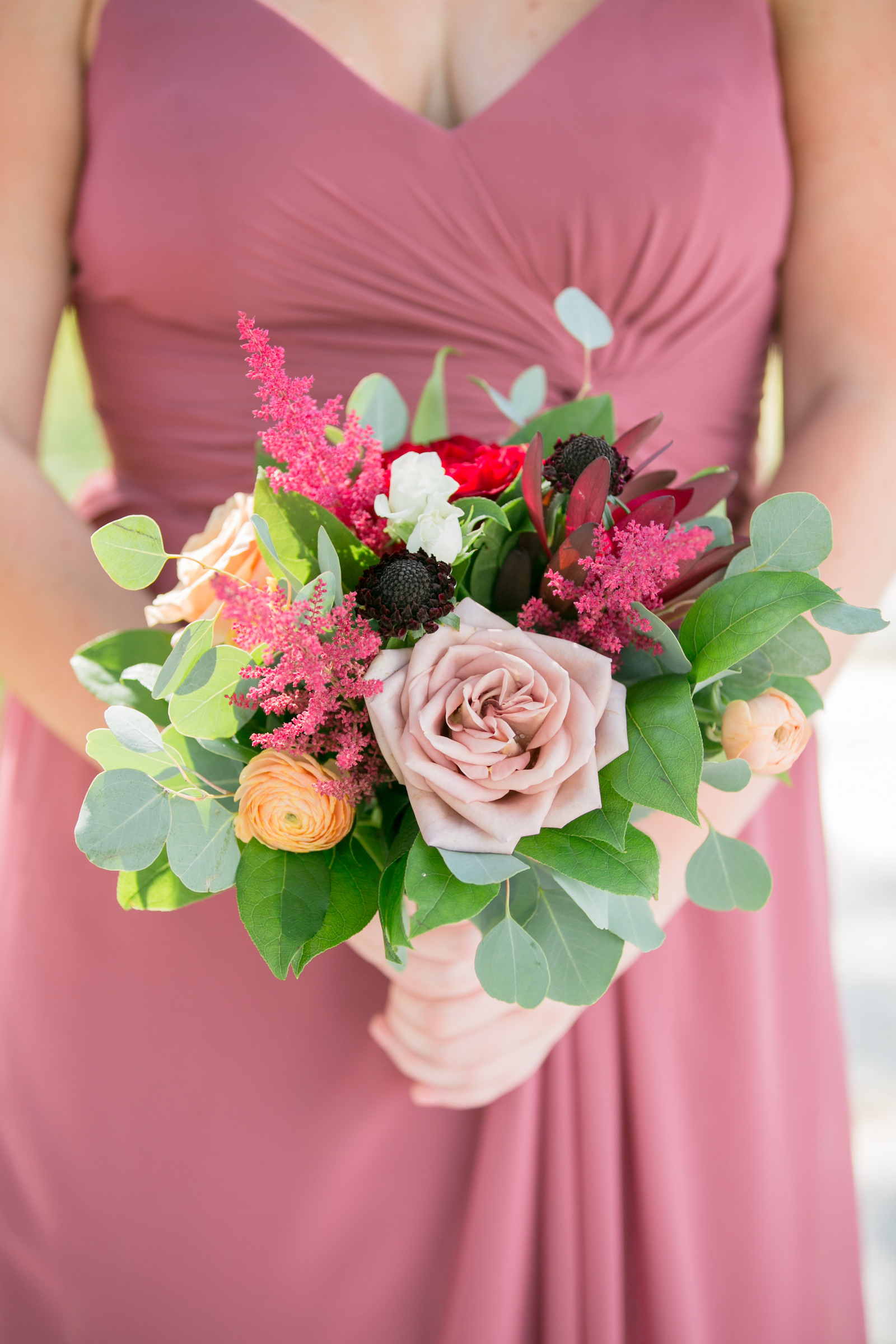 Dusty Rose and Mauve Wedding, Bridesmaids Wearing Dusty Rose Dress Holding Greenery Leaves, Blush Pink Roses, Pink and Red Flower Bouquet | Tampa Bay Wedding Photographer Carrie Wildes Photography | Wedding Florist Iza’s Flowers