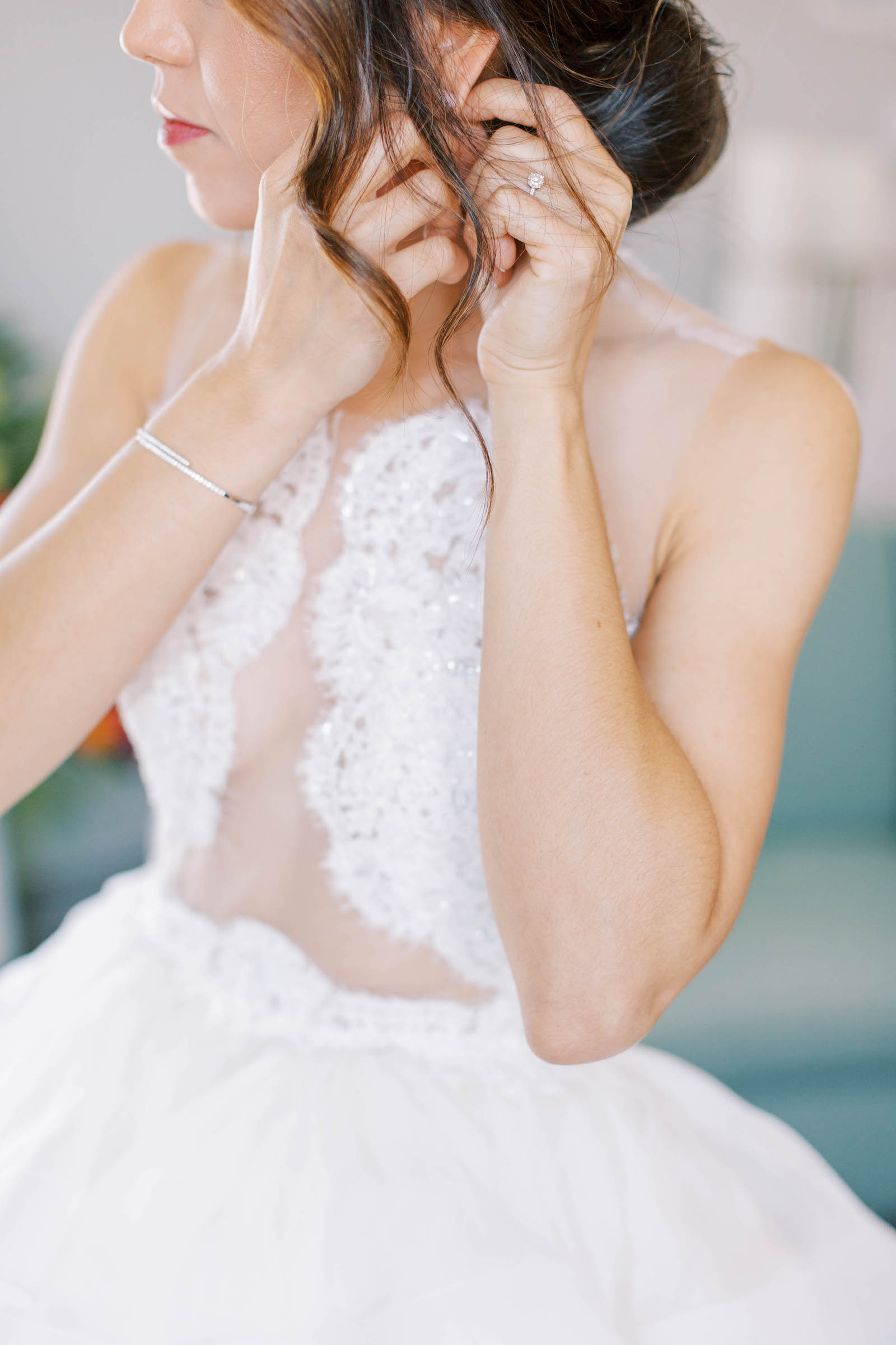 Bride in Lace Detail Illusion Deep V Cut Out Wedding Ballgown Getting Ready Portrait | Parties a la Carte St. Pete Wedding Planner