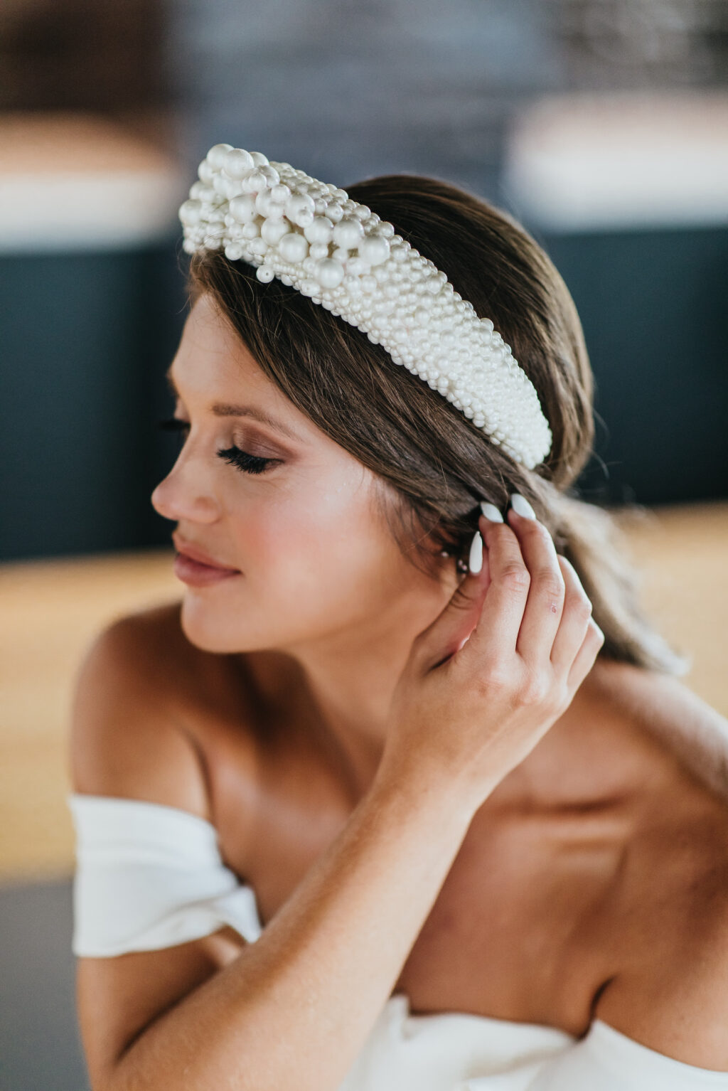 Modern and Edgy Fall Wedding, Bride Wearing Elaborate Thick Pearl Headband and Off the Shoulder Wedding Dress