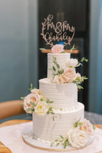 Three Tier Wedding Cake in White With Blush Rose Detail and Gold Laser Cut Cake Topper | MDP Event Planning