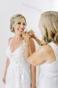 Mother of the Bride Helping Bride Getting Ready Morning of Her Wedding Day Portrait