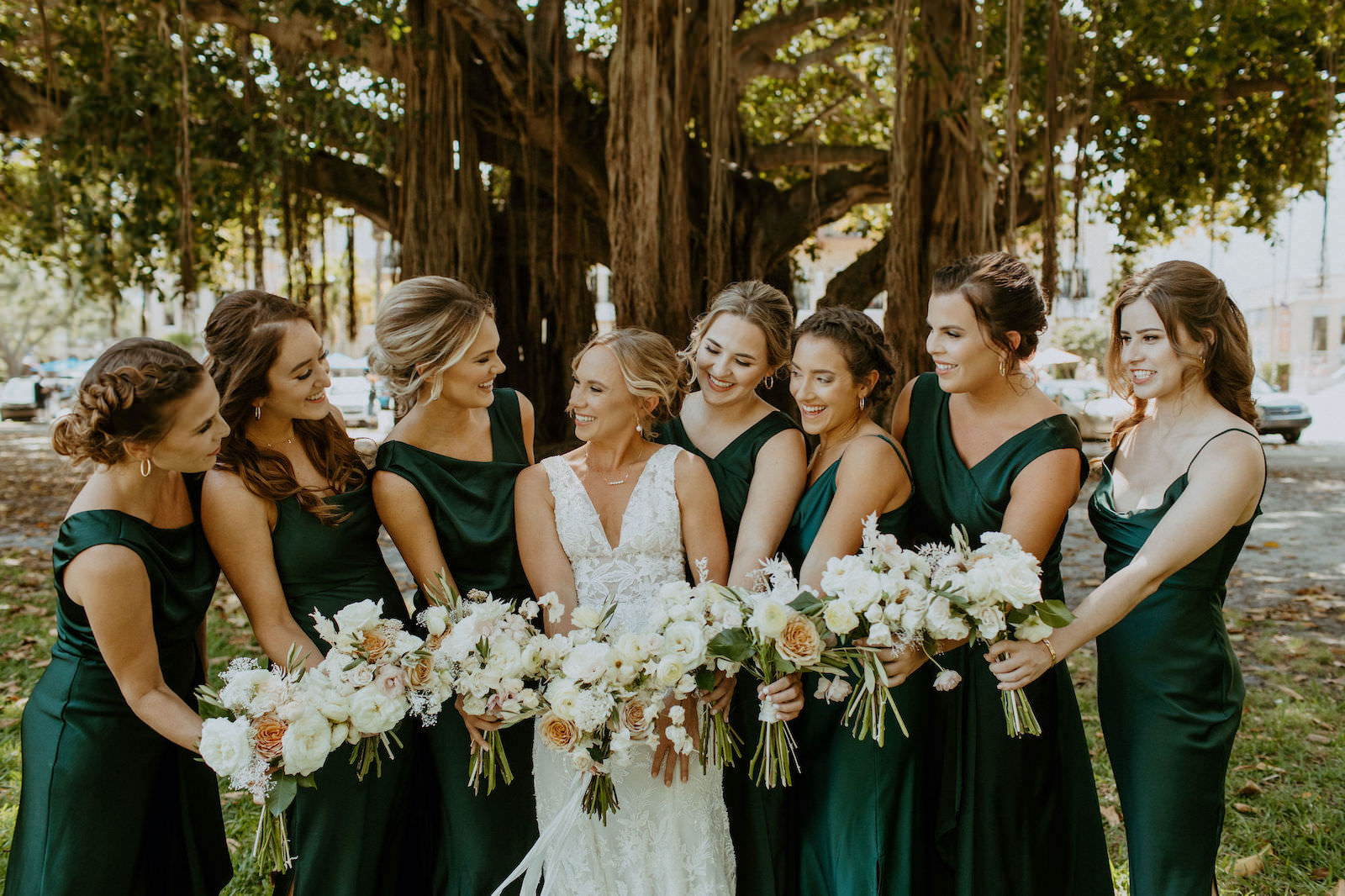 Bride with Bridesmaids in Emerald Green Bridesmaids Dresses Wedding Portrait