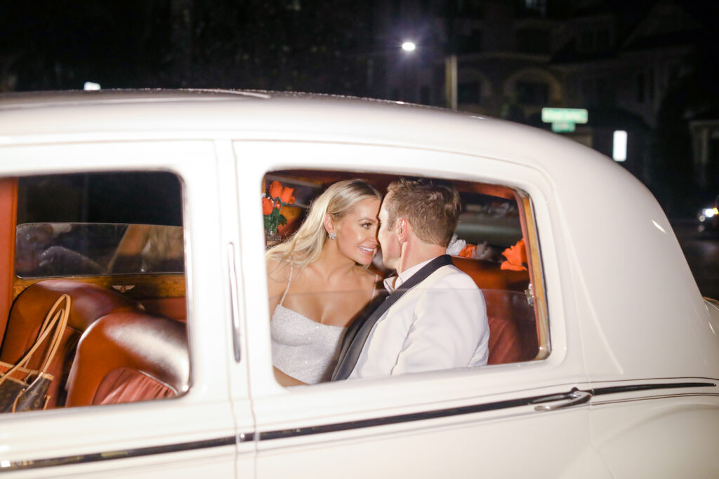 Modern Timeless Black and White Wedding Reception Exit, Bride and Groom in Getaway Car | Tampa Bay Wedding Photographer Lifelong Photography Studio