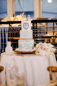 Three Tier White and Blue, Flower Painted, Gold Ribbon, Custom Monogram Wedding Cake | Tampa Bay Wedding Photographer Lifelong Photography Studio