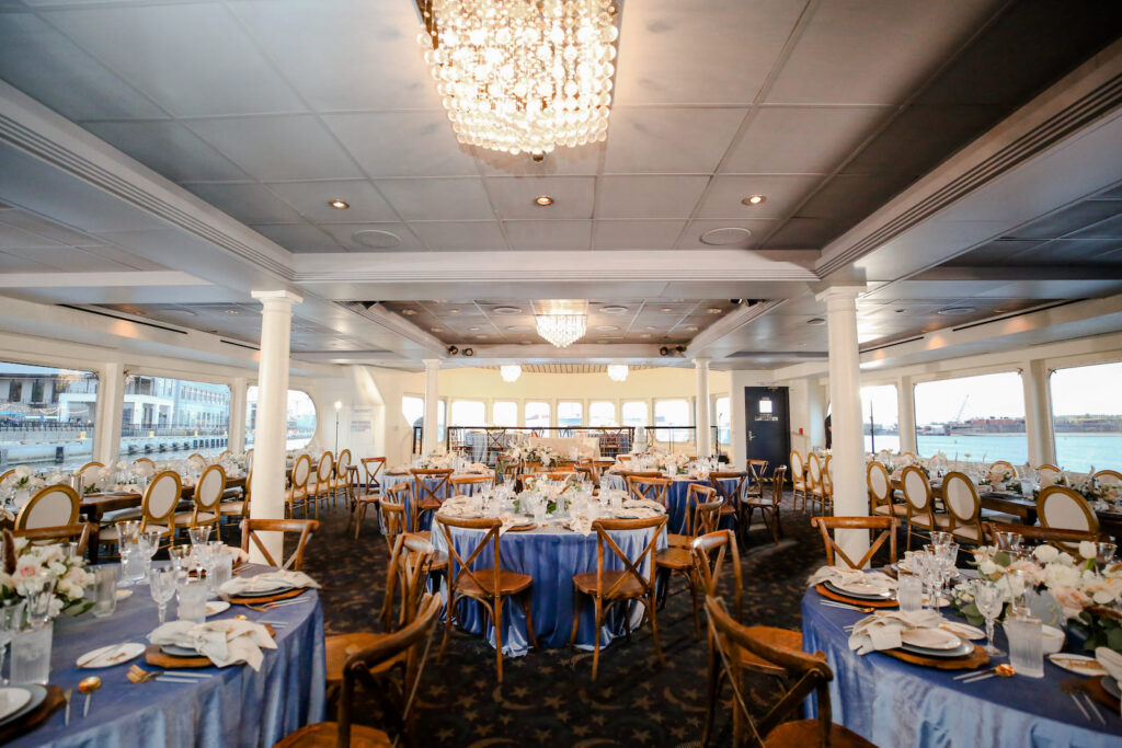 Romantic Blue Nautical Coastal Reception with Cross Back French Country and King Louis Chairs | Downtown Tampa Wedding Venue Yacht Starship | Kate Ryan Event Rentals | Lifelong Photography Studio