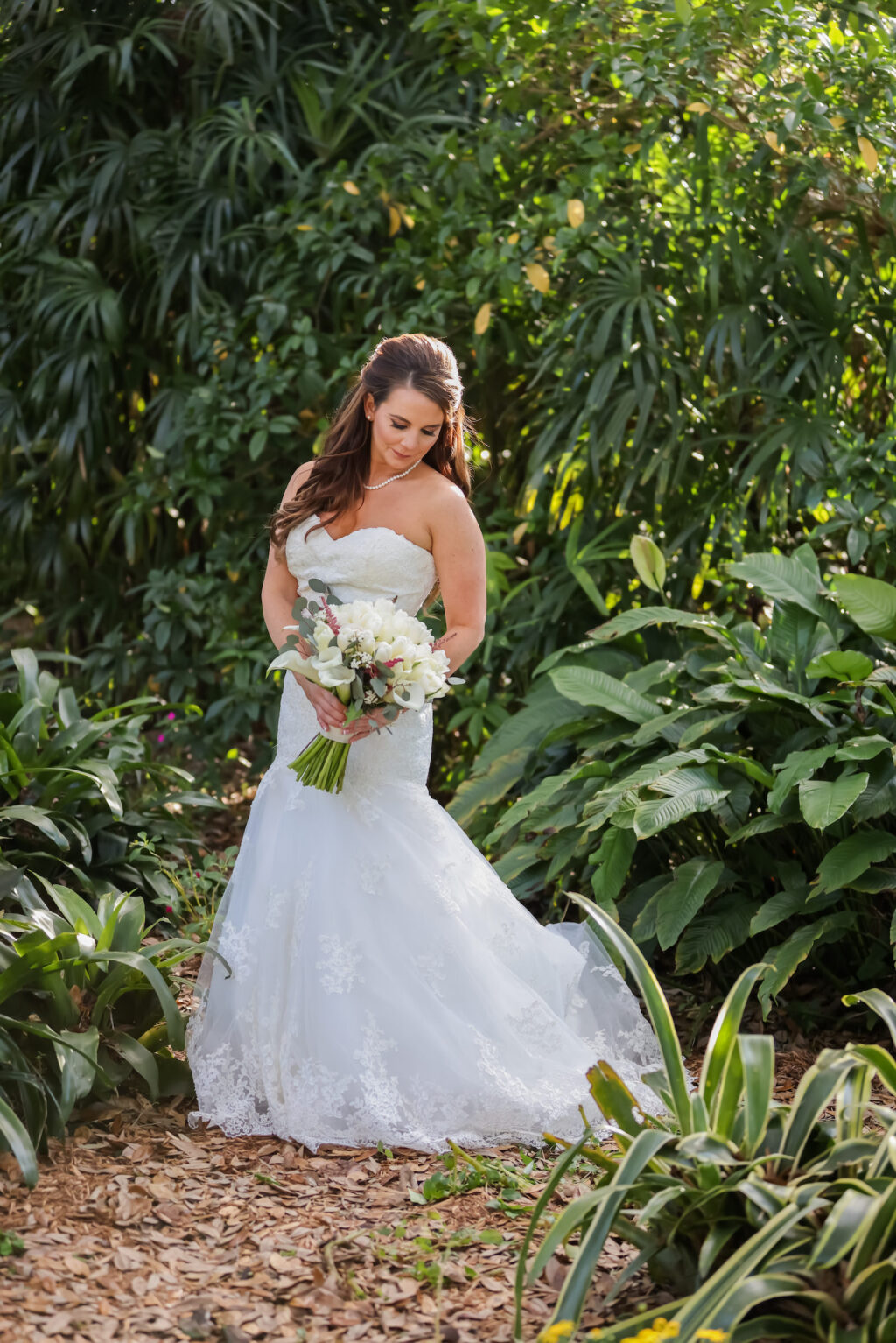 Florida Bride Holding Classic Romantic White Floral Bouquet | Tampa Bay Wedding Photographer Lifelong Photography Studio | Wedding Hair and Makeup Michele Renee the Studio | Wedding Dress Truly Forever Bridal