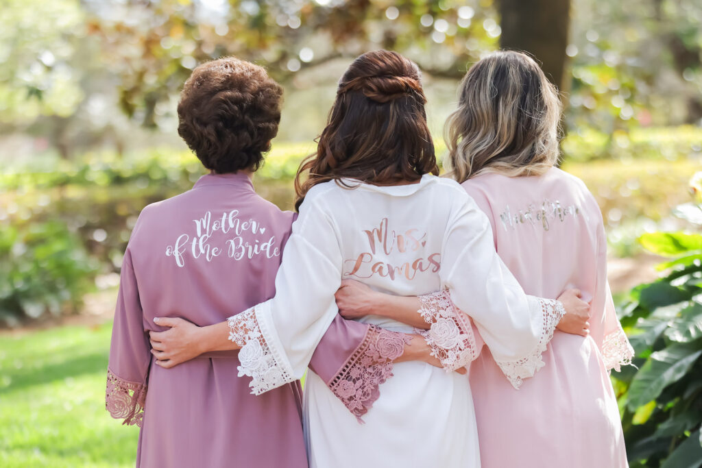 Romantic Pink Wedding, Bride Wearing Personalized White and Lace Robe, Mother of the Bride Wearing Purple Personalized Robe, Maid of Honor Wearing Blush Pink Robe | Tampa Bay Wedding Photographer Lifelong Photography Studio | Wedding Hair and Makeup Michele Renee the Studio