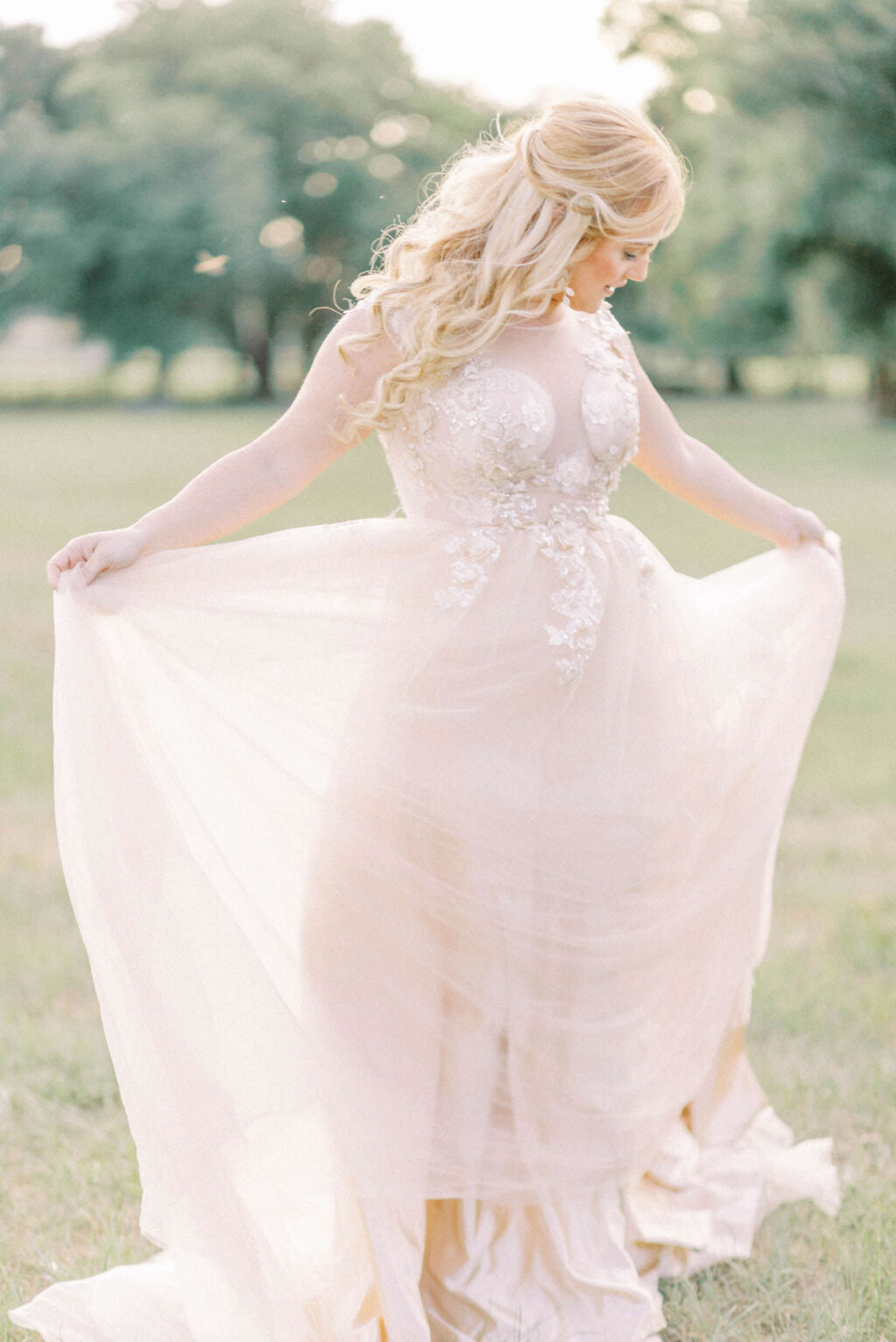 Florida Bride Wearing Lace and Romantic Blush Pink Boho High Neck Wedding Dress | Garden Whimsical Wedding Styled Shoot at Wedding Venue Mill Pond Estate