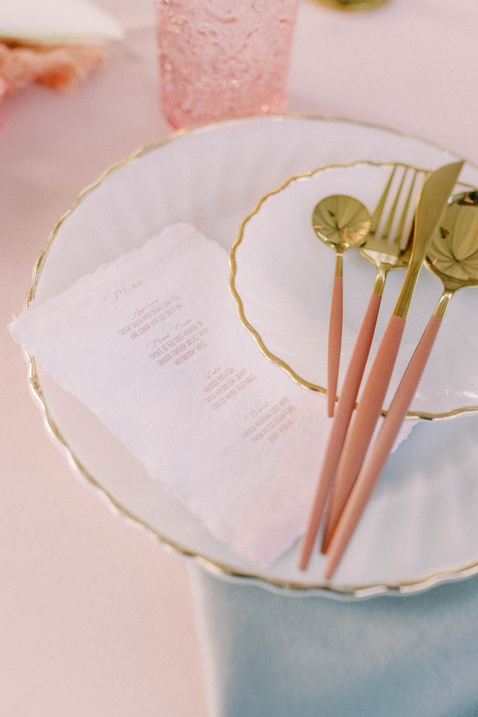 Garden Whimsical Wedding Decor, White and Gold Rimmed Charger, Pink and Gold Silverware | Kate Ryan Event Rentals