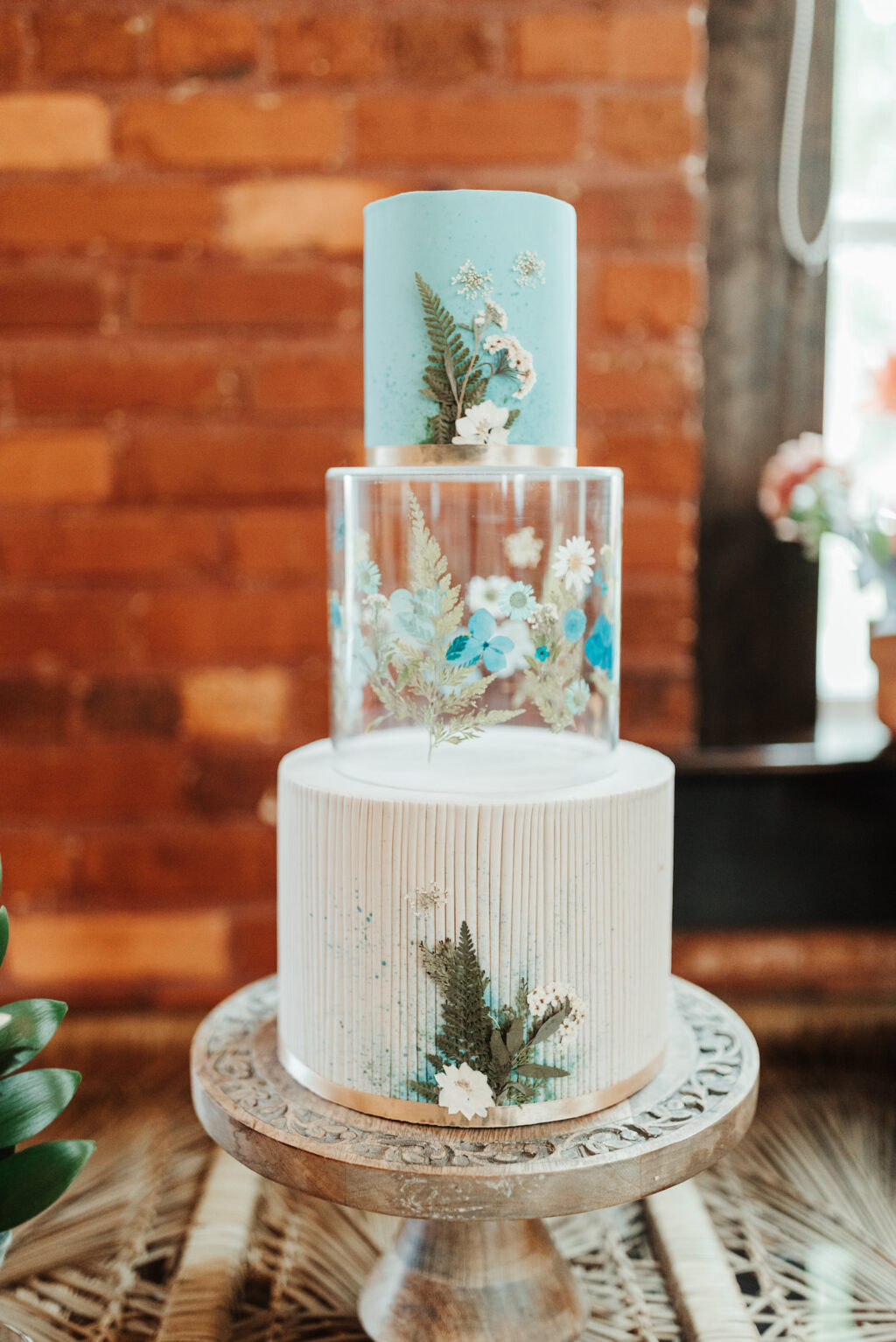 Boho Industrial Wedding Cake Table with Three Tier Cake in White, Blue, and Acrylic | Tampa Wedding Baker The Artistic Whisk