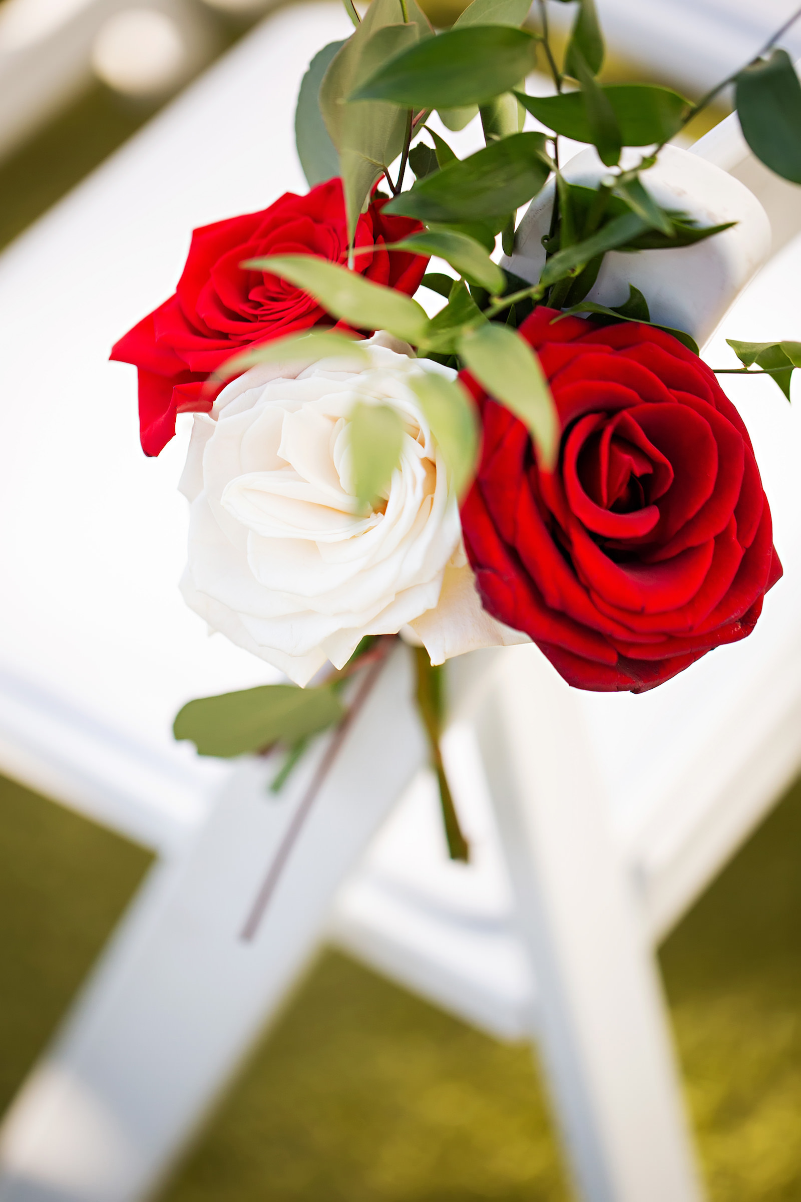 White and Red Rose Detailing for Florida Hotel Wedding Ceremony | Florida Planner Elegant Affairs by Design | Clearwater Florist Save the Date Florida