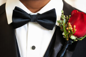 Elegant Garden Wedding, Groom Wearing Black Bowtie and Red Rose Boutonierre | Tampa Bay Wedding Photographer Limelight Photography | Wedding Florist Lemon Drops