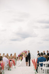 Vibrant Boho Bride and Groom Exchanging Wedding Vows on the St. Pete Beach | Tampa Bay Wedding Officiant A Wedding with Grace