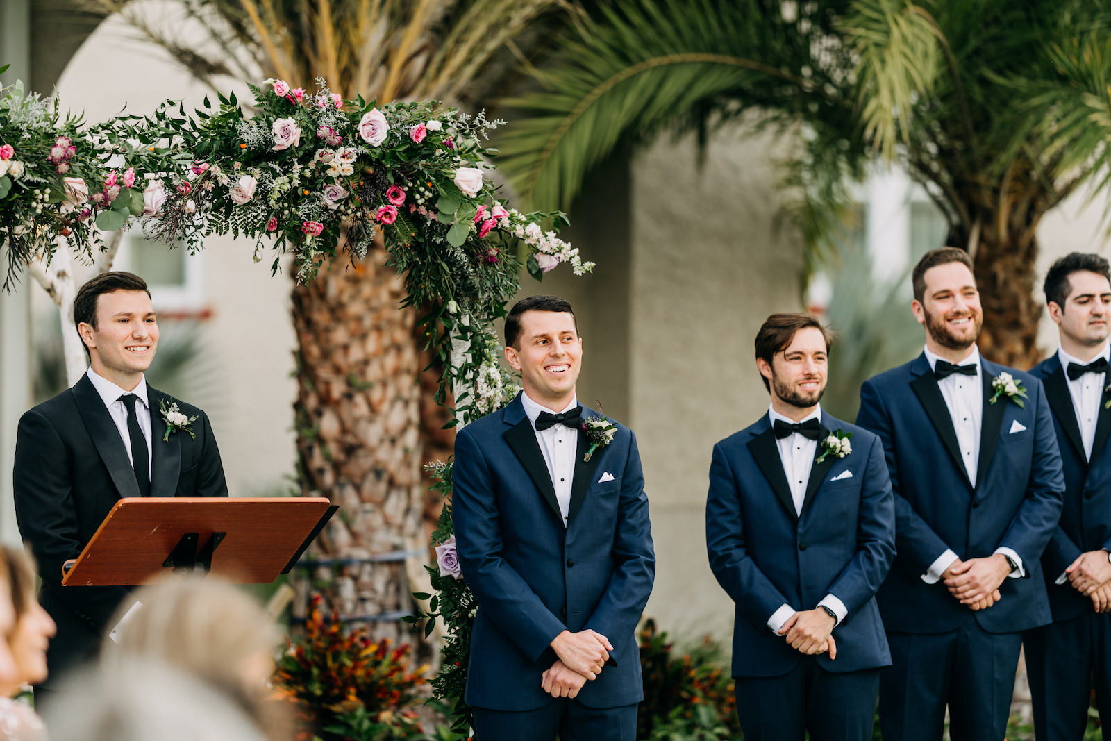 Florida Groom Reaction to Watching Bride Walking Down the Wedding Ceremony Aisle Wearing Midnight Blue Tuxedo | Tampa Bay Wedding Photographer Amber McWhorter Photography | Wedding Florist Leaf It To Us