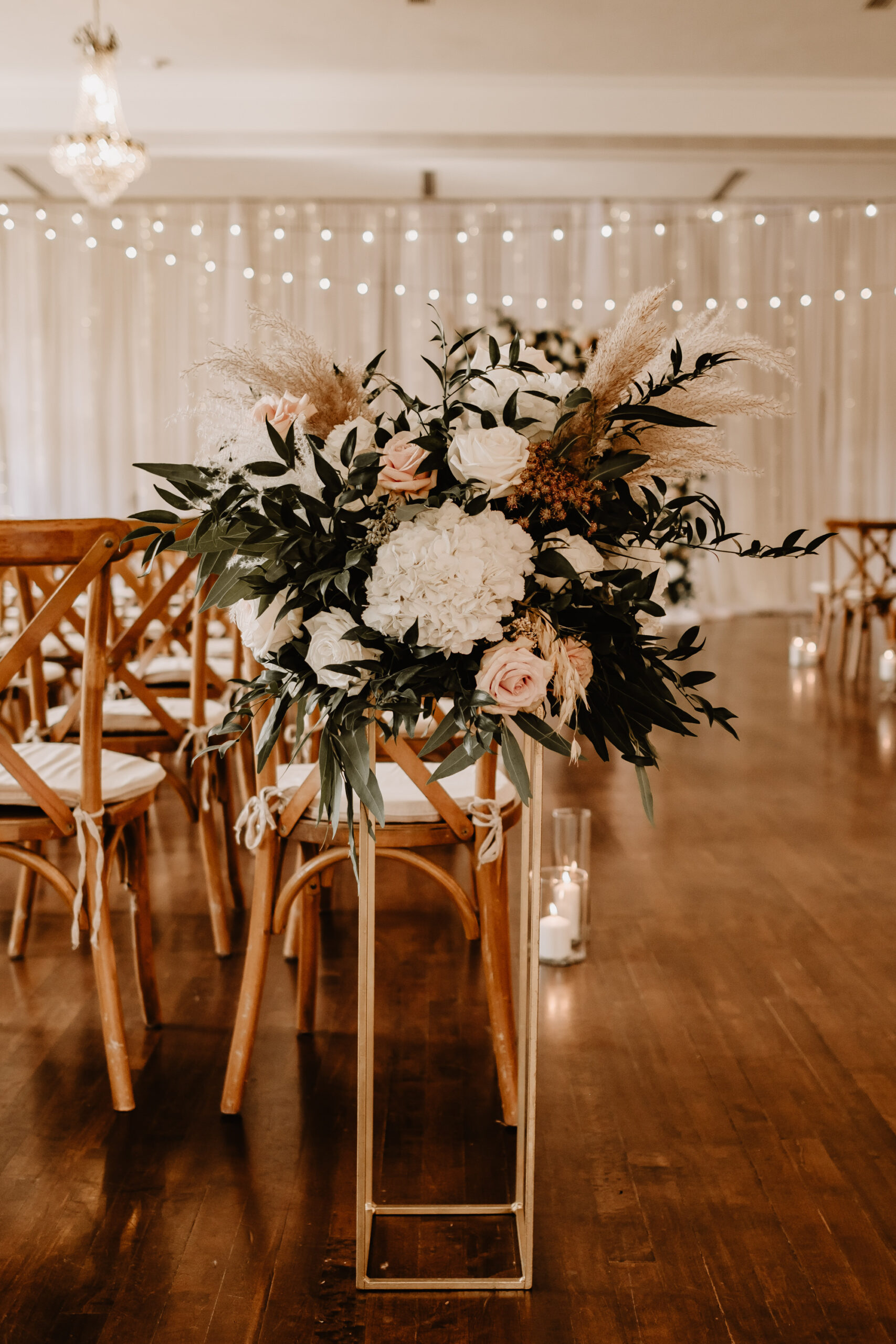 Neutral Boho Modern Wedding Ceremony Decor, Tall Gold Stand with Lush White Hydrangeas, Blush Pink Roses, Greenery, Pampas Grass Floral Arrangement | Tampa Bay Wedding Planner Taylored Affairs | Wedding Rentals Gabro Event Services