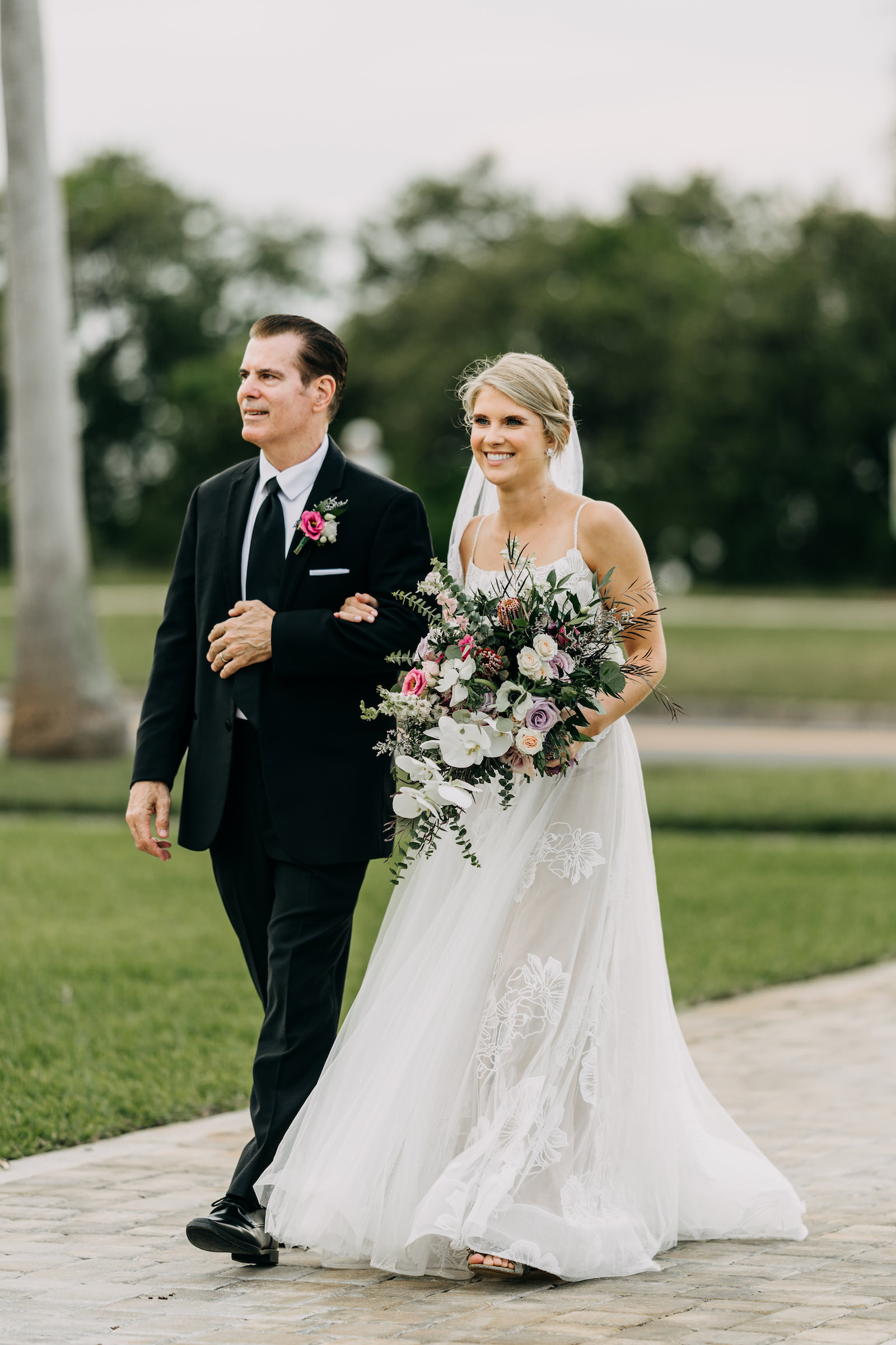Florida Bride Walking with Father Down Wedding Ceremony Aisle | Tampa Bay Wedding Photographer Amber McWhorter Photography | Wedding Florist Leaf It To Us