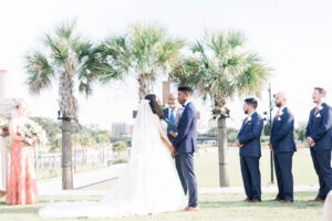 Bride and Groom Exchanging Vows at Outdoor Downtown Tampa Wedding Ceremony