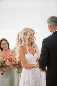 Boho Bride Exchanging Wedding Vows During Wedding Ceremony Portrait | Tampa Bay Wedding Hair and Makeup Femme Akoi Beauty Studio