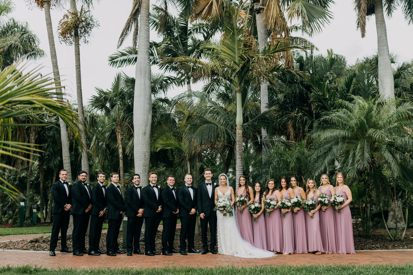Tropical Wedding Party With Bridesmaids in Long Purple Dresses Wedding Portrait | Amber McWhorter Photography