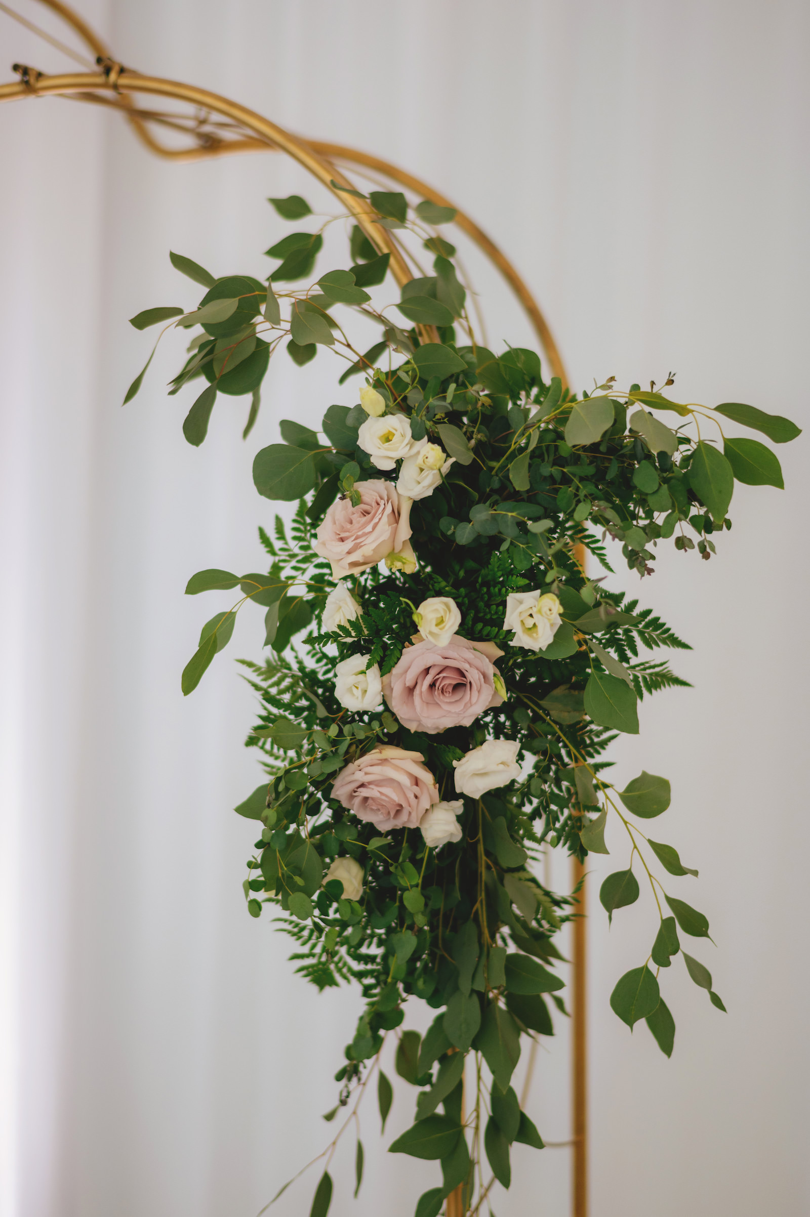 Modern Minimalist Wedding Reception Decor, Unique Arch with Greenery and Blush Pink and White Roses Floral Arrangement