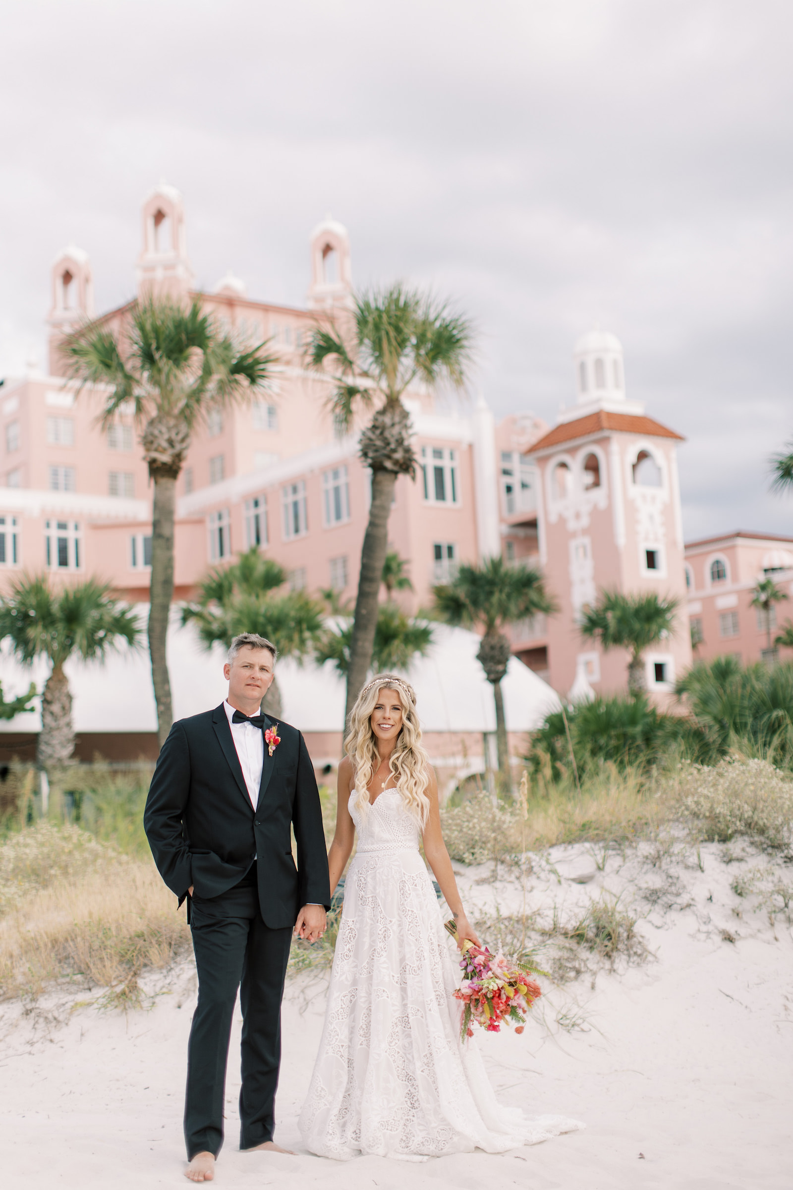 Vibrant Boho Bride and Groom Portrait on Beach | St. Petersburg Waterfront Wedding Venue The Don CeSar | Tampa Bay Wedding Hair and Makeup Femme Akoi Beauty Studio