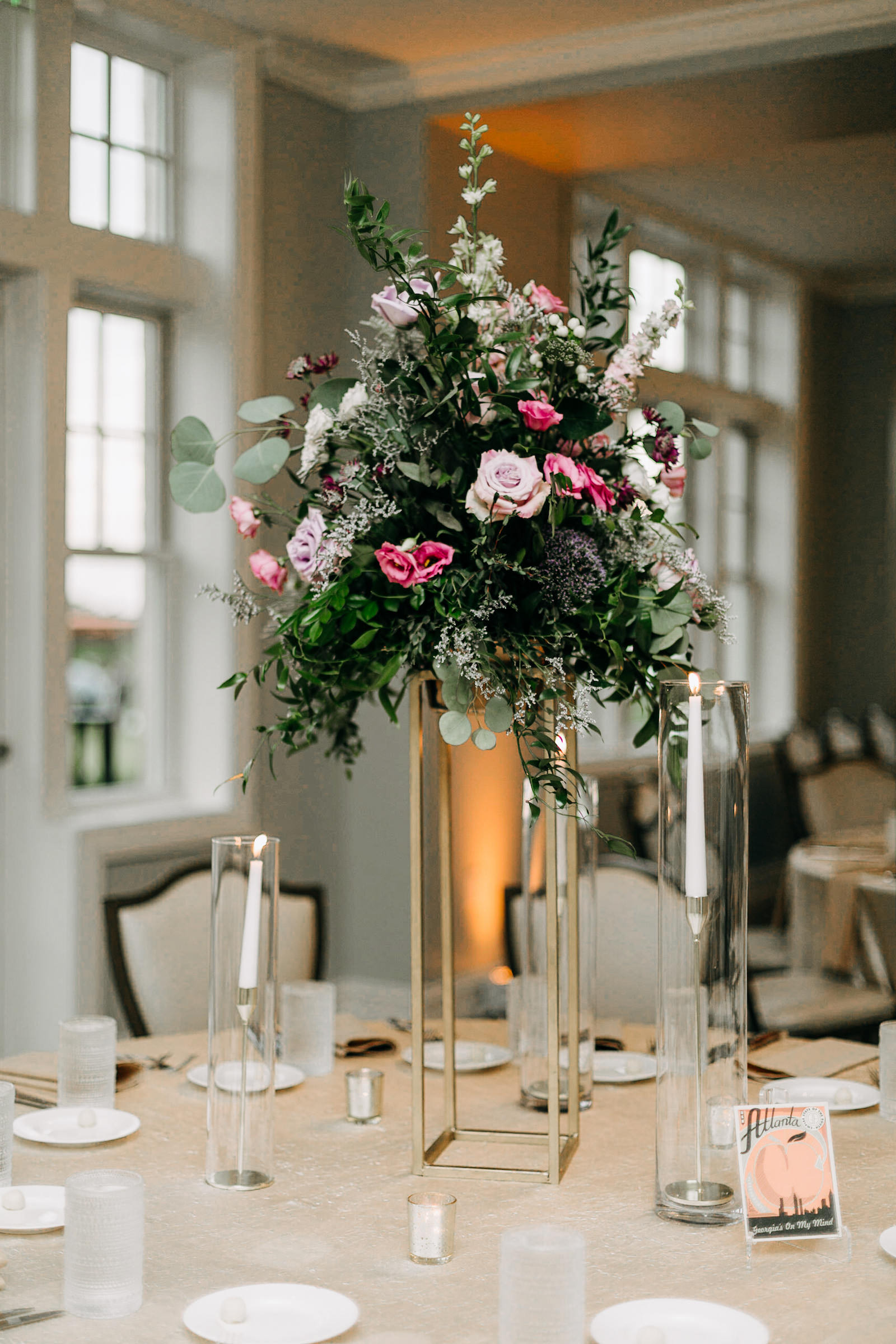 Wedding Reception Decor, Lush Wedding Floral Centerpiece, Greenery with Pink and Purple Roses | Tampa Bay Wedding Photographer Amber McWhorter Photography | Wedding Florist Leaf It To Us