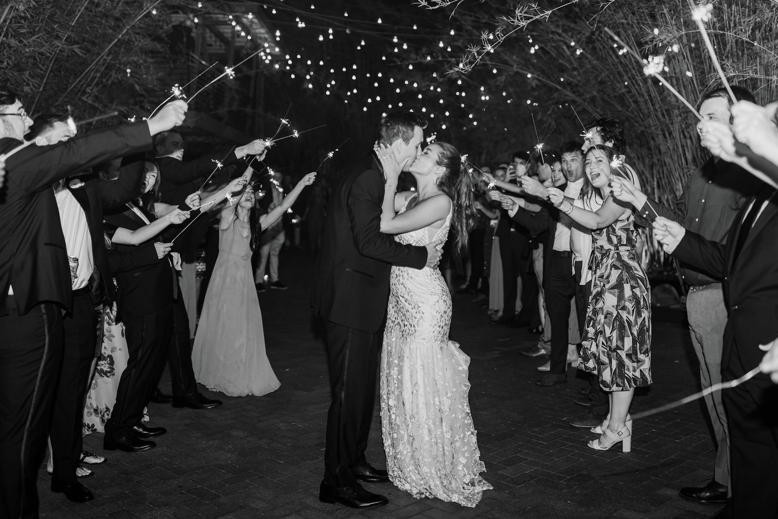 Bride and Groom Sparkler Exit in Black and White Wedding Portrait | Florida Wedding Photographer Amber McWhorter Photography