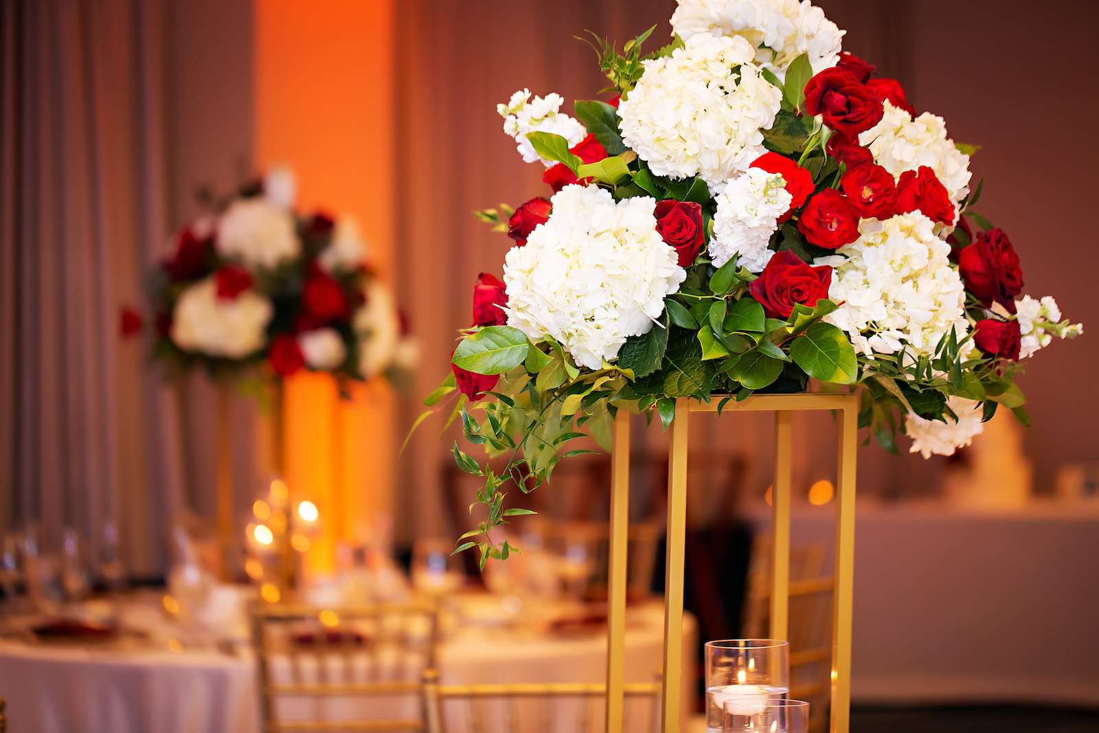 White and Red Rose Wedding Centerpieces on Gold Stands with Greenery | Florida Florist Save the Date Florida