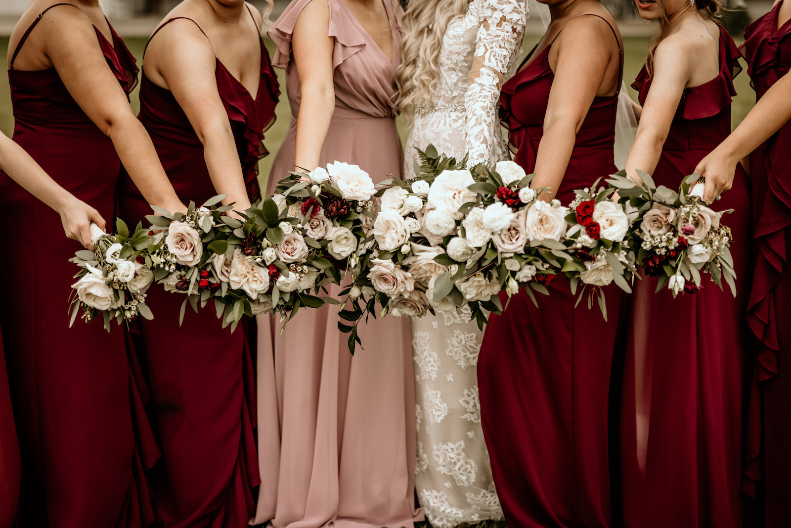 Burgundy and Blush Mix and Match Floor Length Bridesmaids Dresses with Blush White and Burgundy Rose Bouquets with Greenery