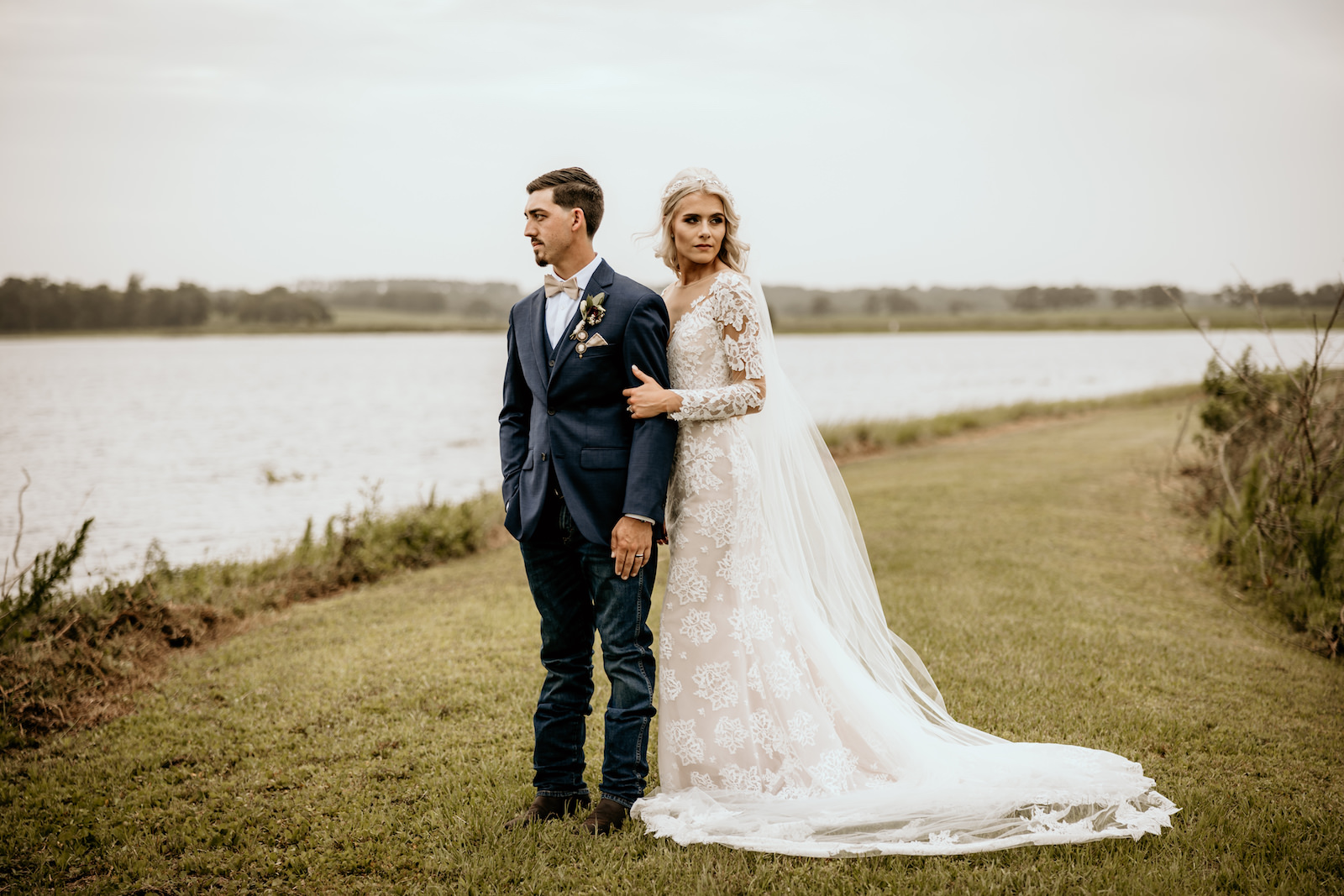 Bride and Groom Wedding Portrait by a Lake | Rustic Tampa Wedding Venue Covington Farm