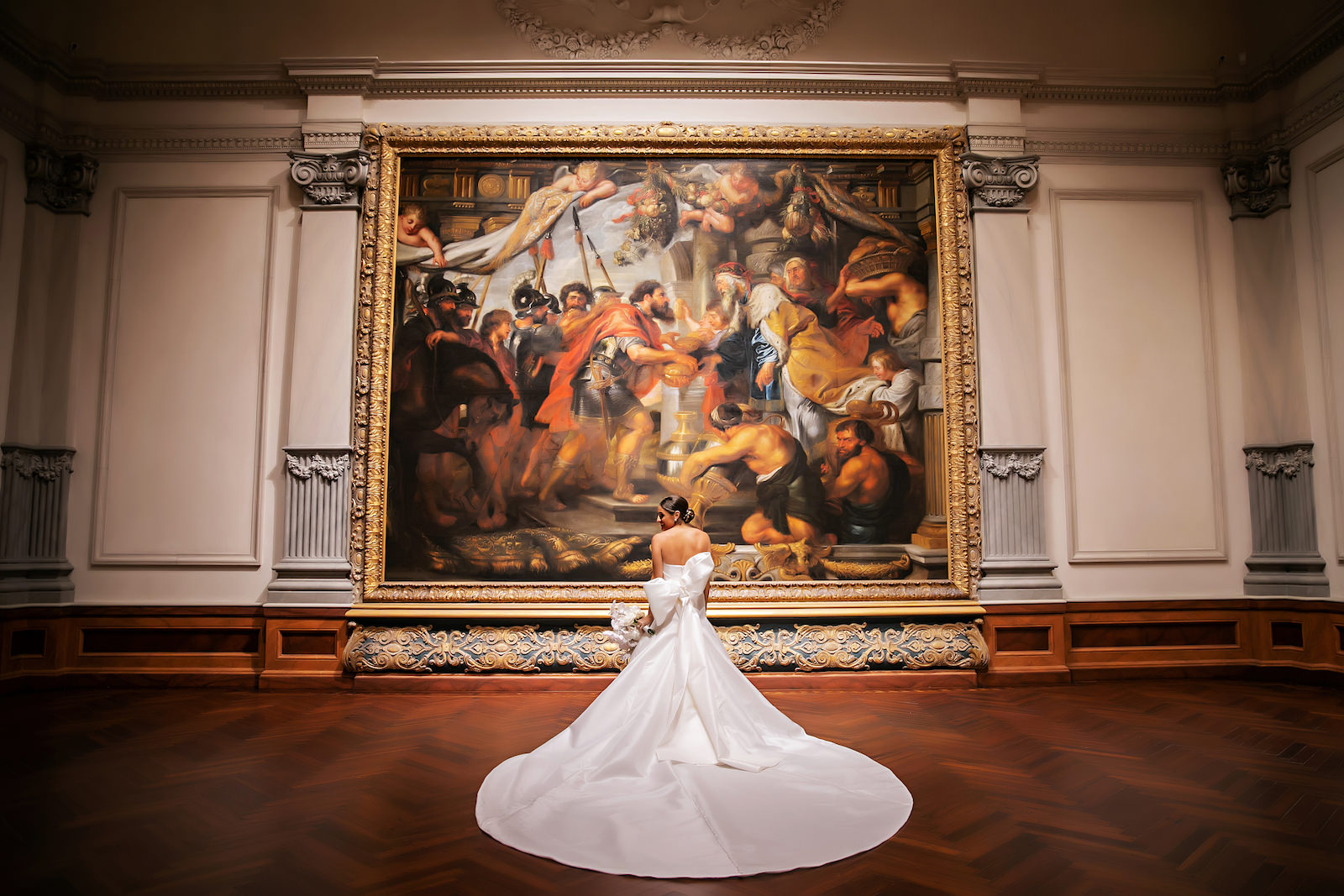 Luxurious Modern Chic Bride Wearing Pronovias Wedding Dress with Bow Wedding Portrait in Art Gallery at Sarasota Wedding Venue Ringling Museum | Tampa Bay Wedding Photographer Limelight Photography