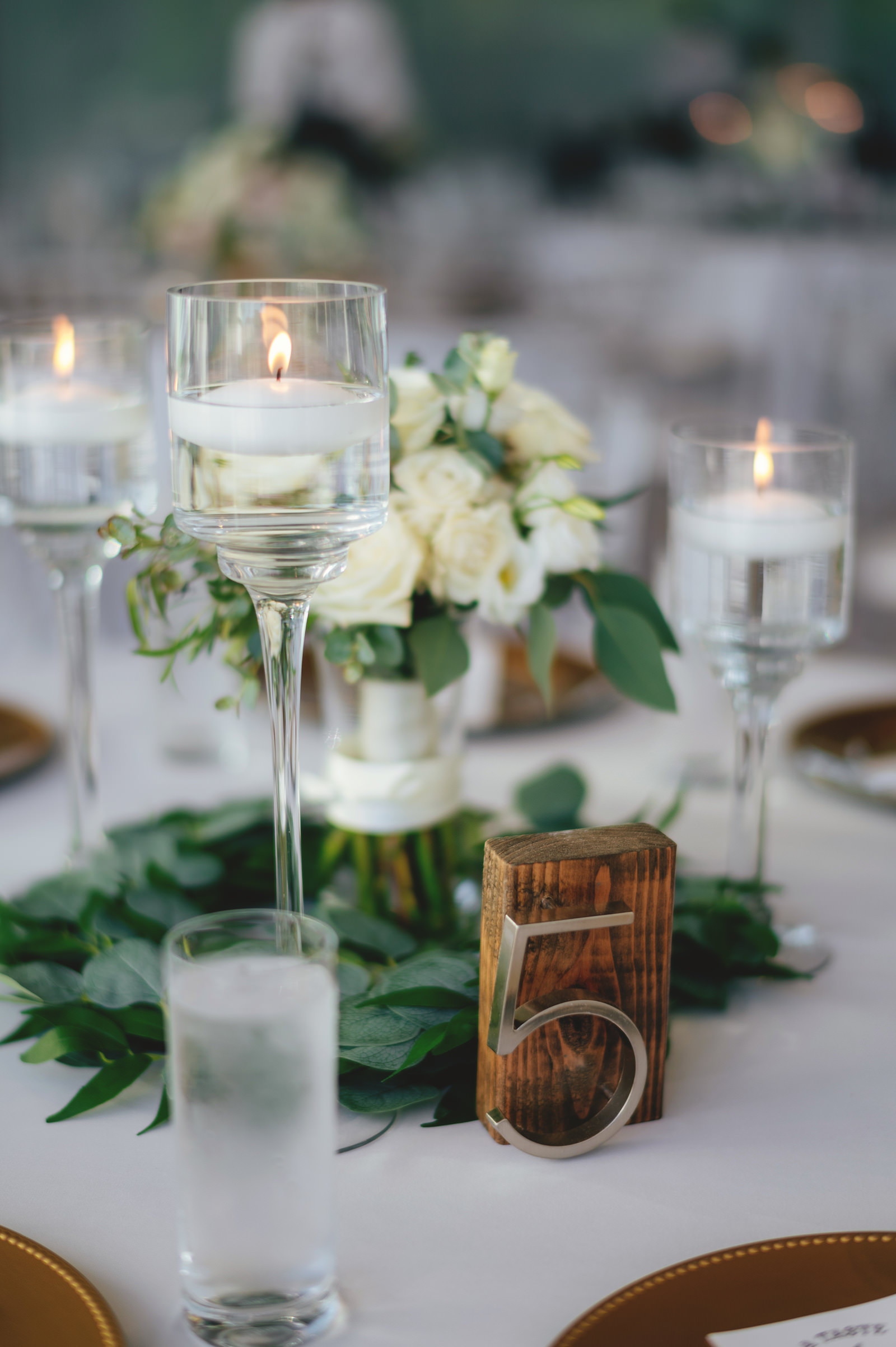 Candle Centerpieces and Wooden Modern Minimalistic Table Numbers | Elegant Reception Decor Inspiration