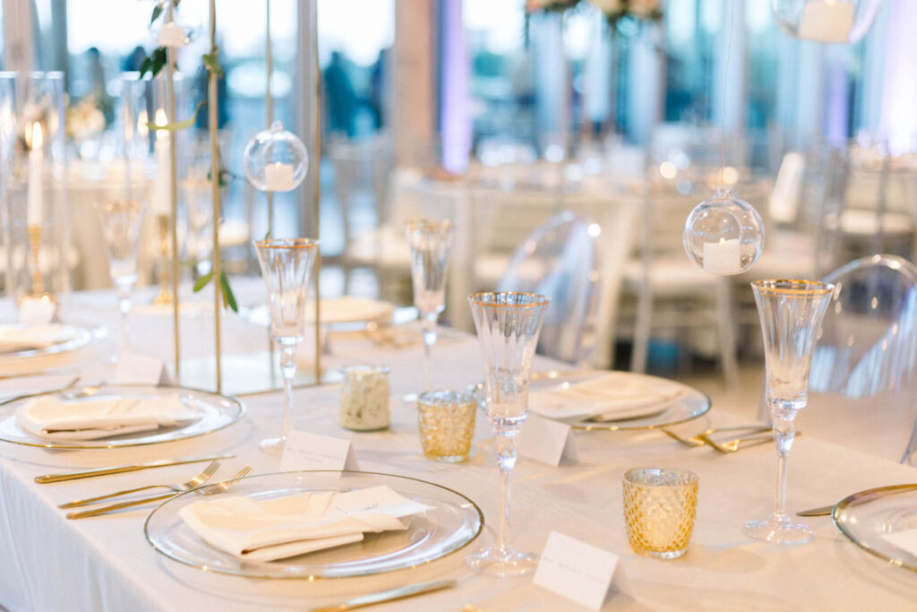 Classic White and Gold Wedding Tablescape with Gold Candle Holders | Kate Ryan Event Rentals | Tampa Caterer Elite Events Catering