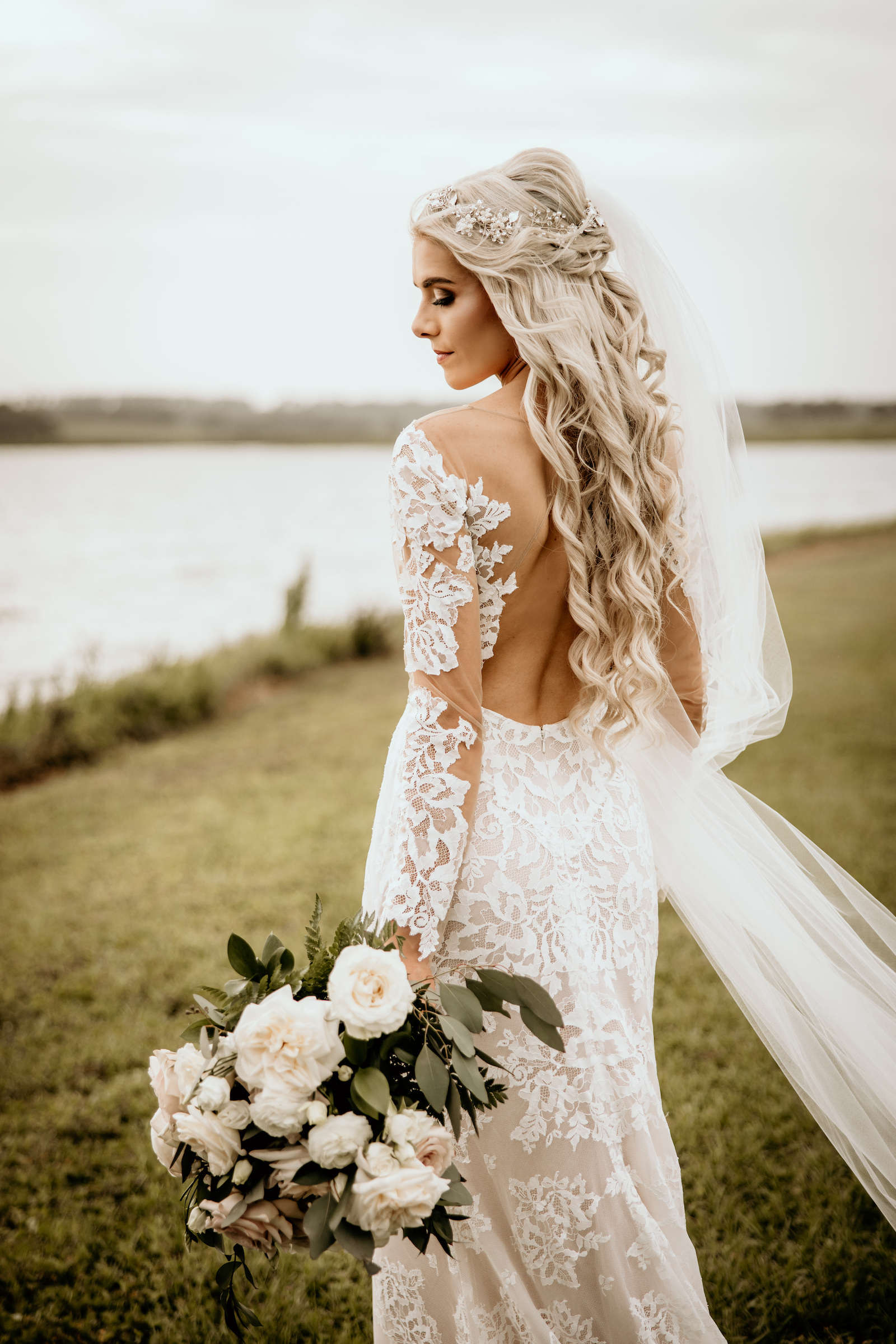 Bride with Smokey Eye and Soft Curls with Beaded Head Piece | Lace Illusion Long Sleeve Boho Wedding Dress | Tampa Bay Adore Bridal Hair and Makeup