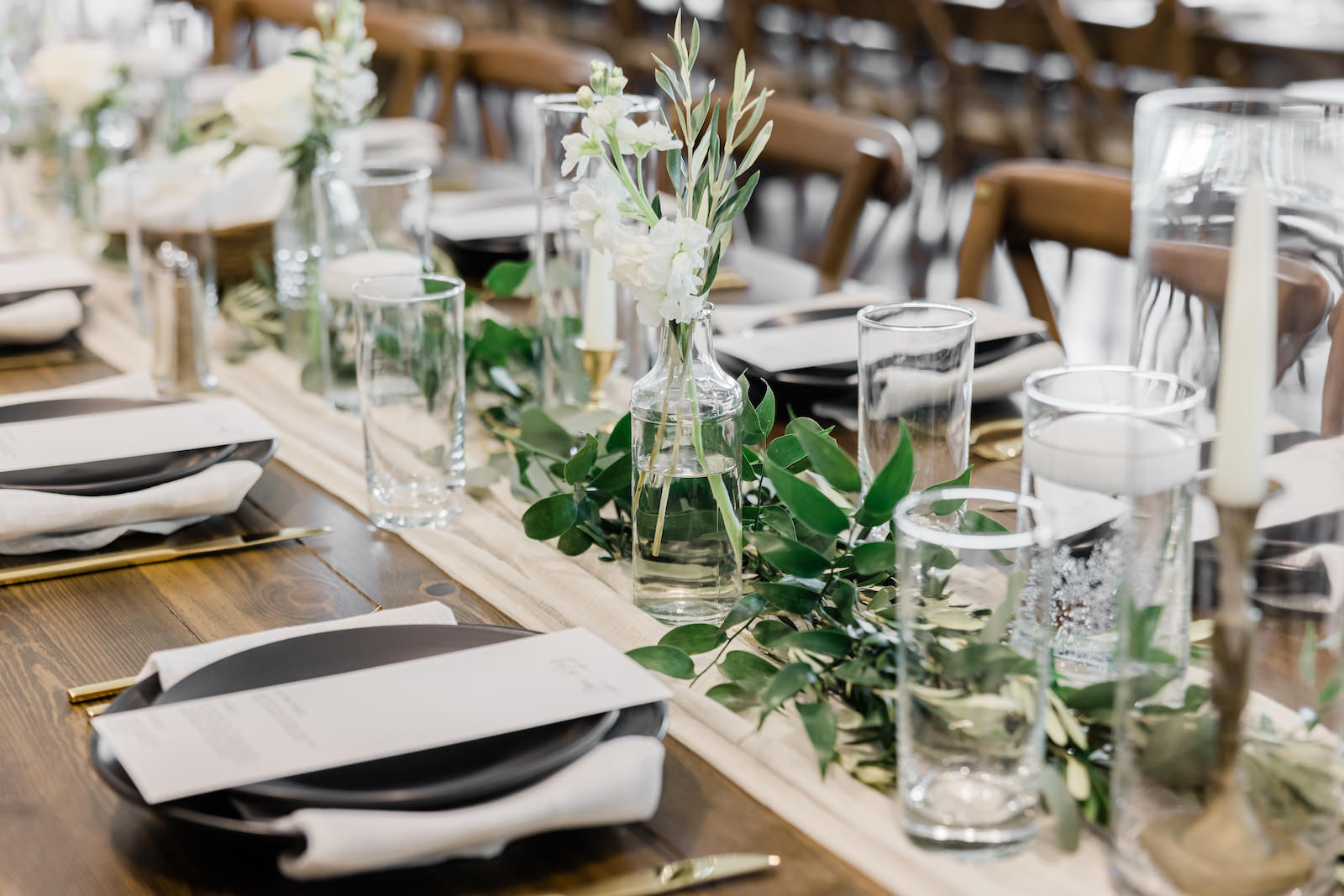 Tampa Classic Black and White Wedding Reception Decor, Candlesticks, Greenery Garland Table Runner, Black Plates, Low One Stem White Flower Centerpieces