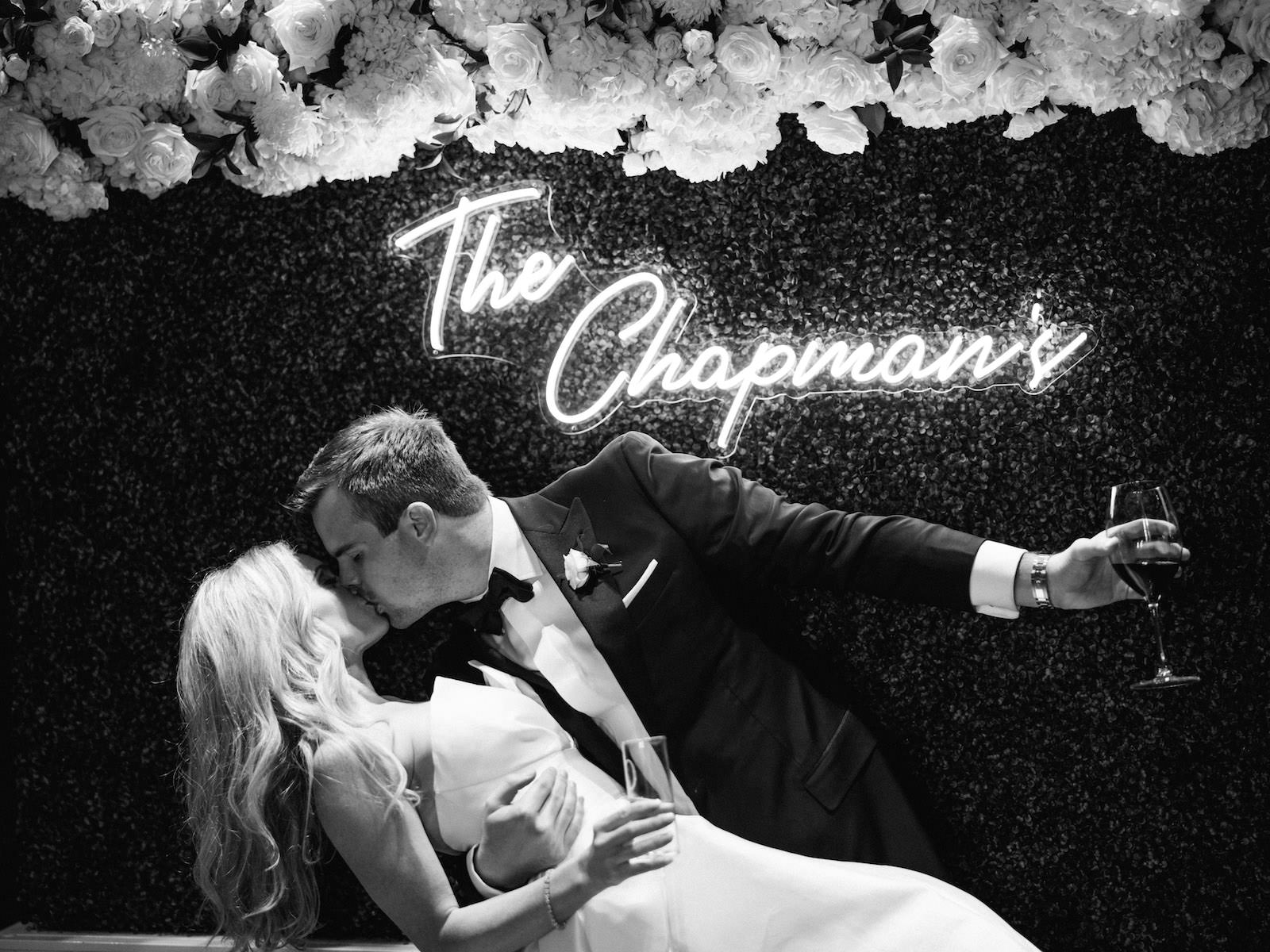 Luxurious Formal Wedding Reception, Groom Dip Kissing Bride, Neon Sign | Tampa Bay Wedding Planner Parties A'la Carte