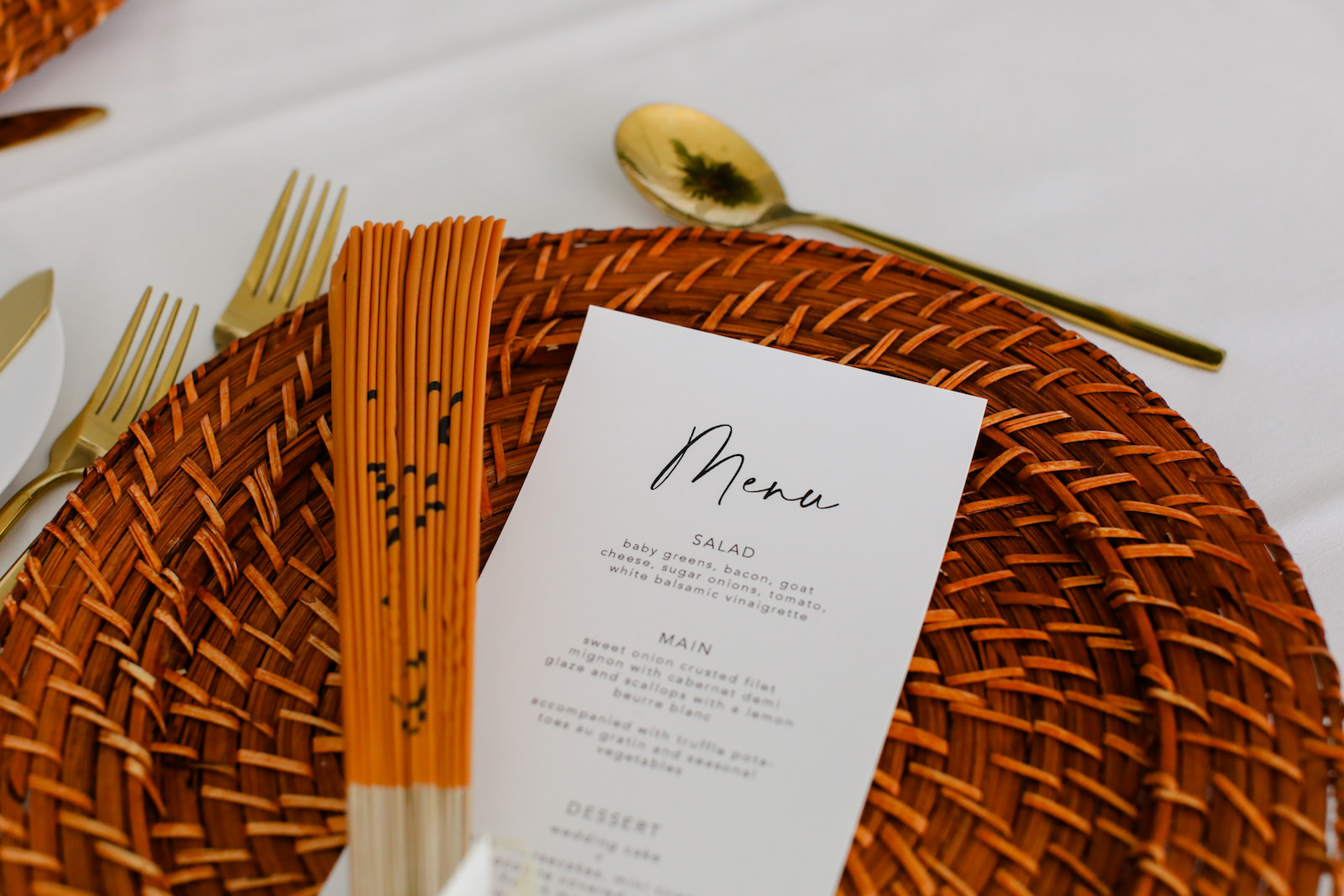 Woven Charger with Gold Flatware with Asian Inspired Fans | Gabro Event Services