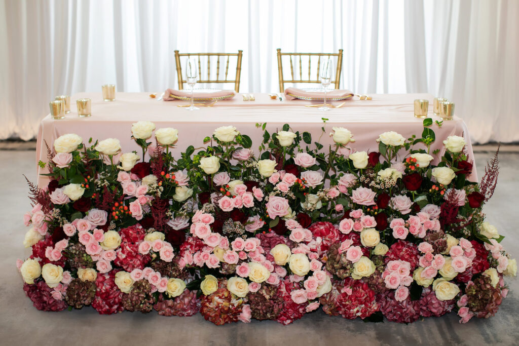 Lush Burgundy, Pink and White Roses and Greenery Floral Sweetheart Table for Garden Inspired Ballroom Wedding | Tampa Bay Photographer Limelight Photography | Florist Lemon Drops | Planner Breezin Weddings