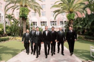 Groom and Groomsmen Wearing Black Suits/Tuxedos | St. Pete Historic Wedding Venue The Don CeSar