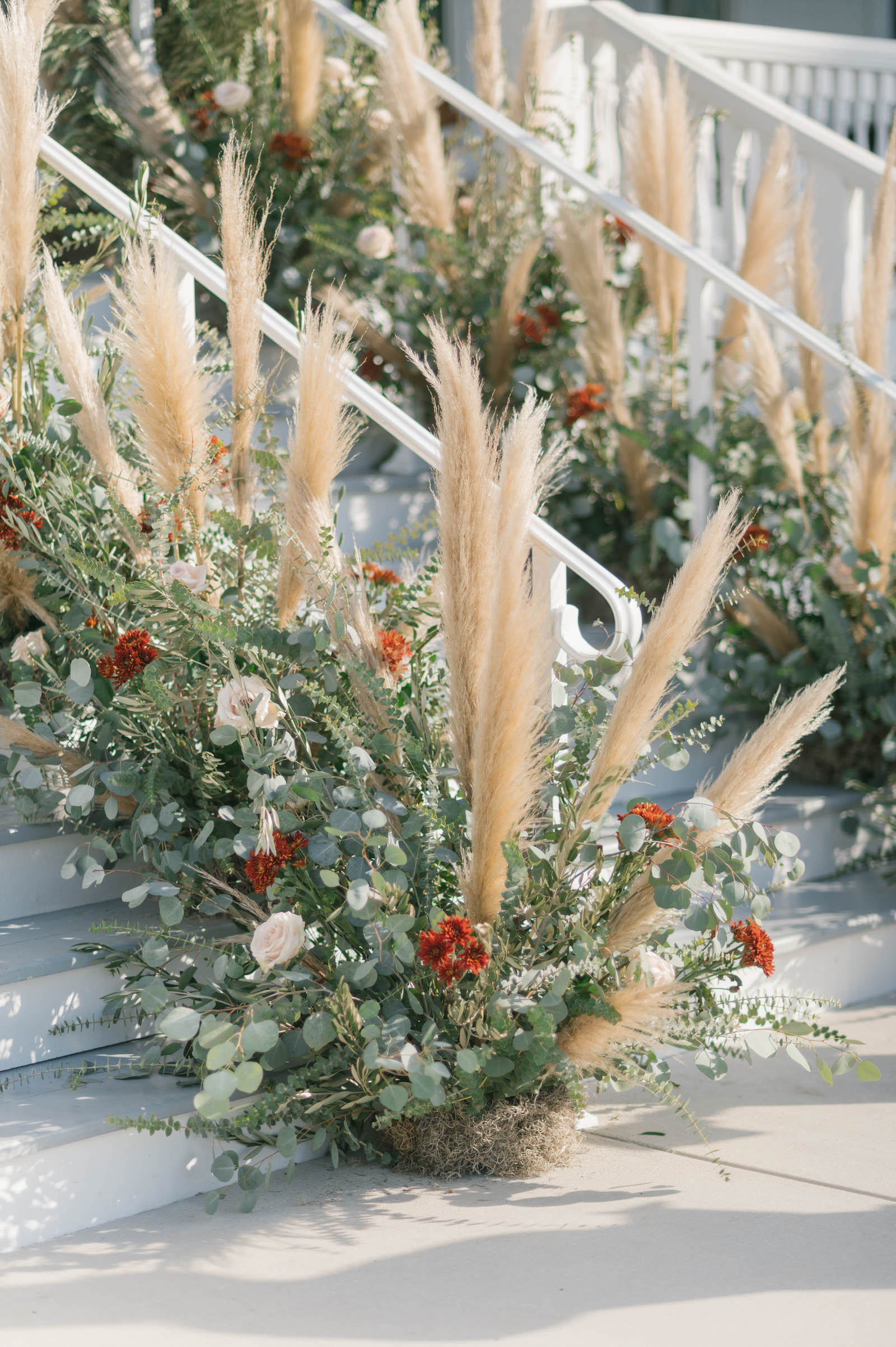 Boho Garden Wedding Ceremony Decor, Greenery Eucalyptus, Red Flowers, Blush Pink Roses, Pampas Grass Lush Floral Arrangements Lining Staircase